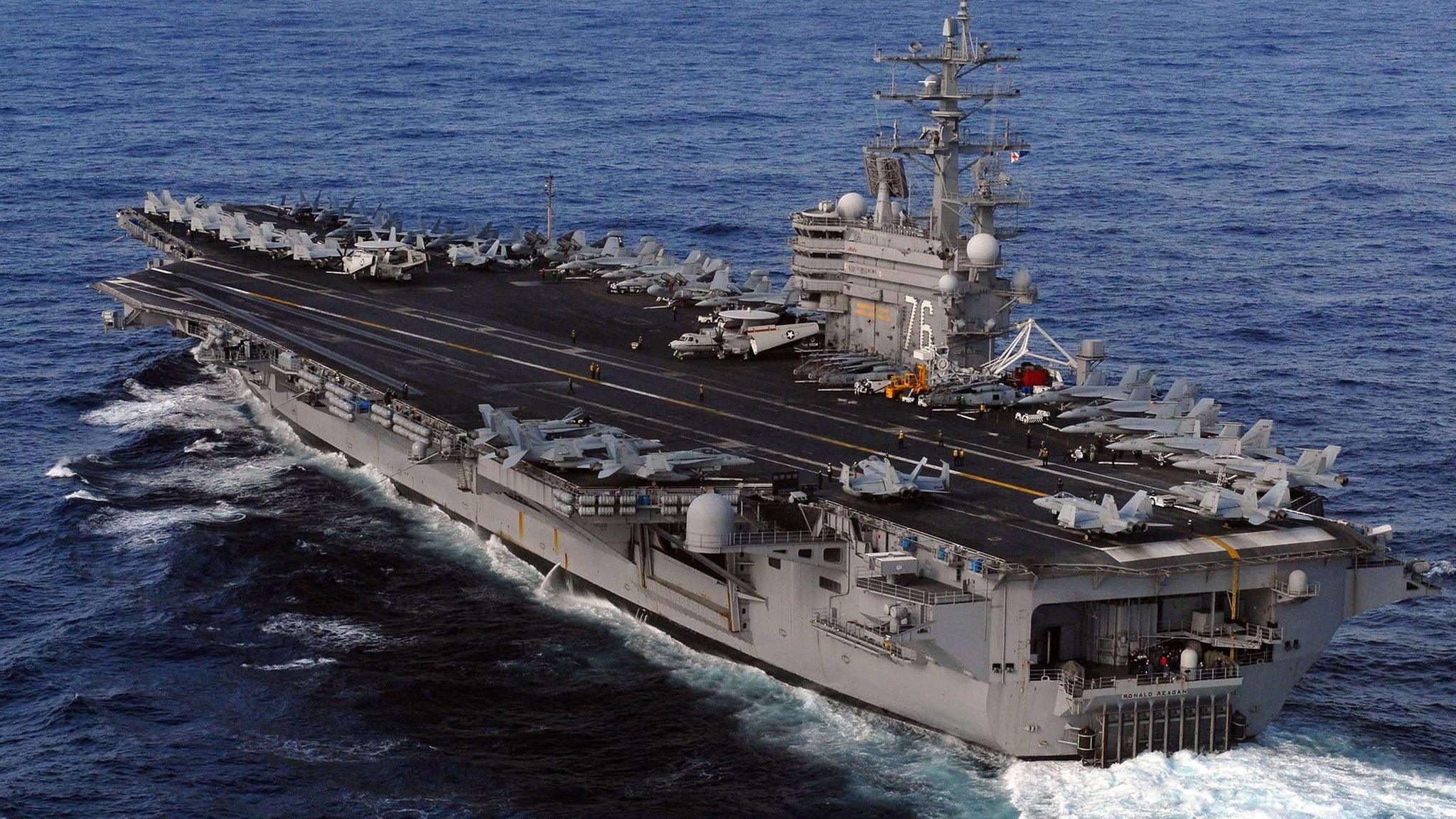 A US Nimitz-class aircraft carrier in the Pacific Ocean