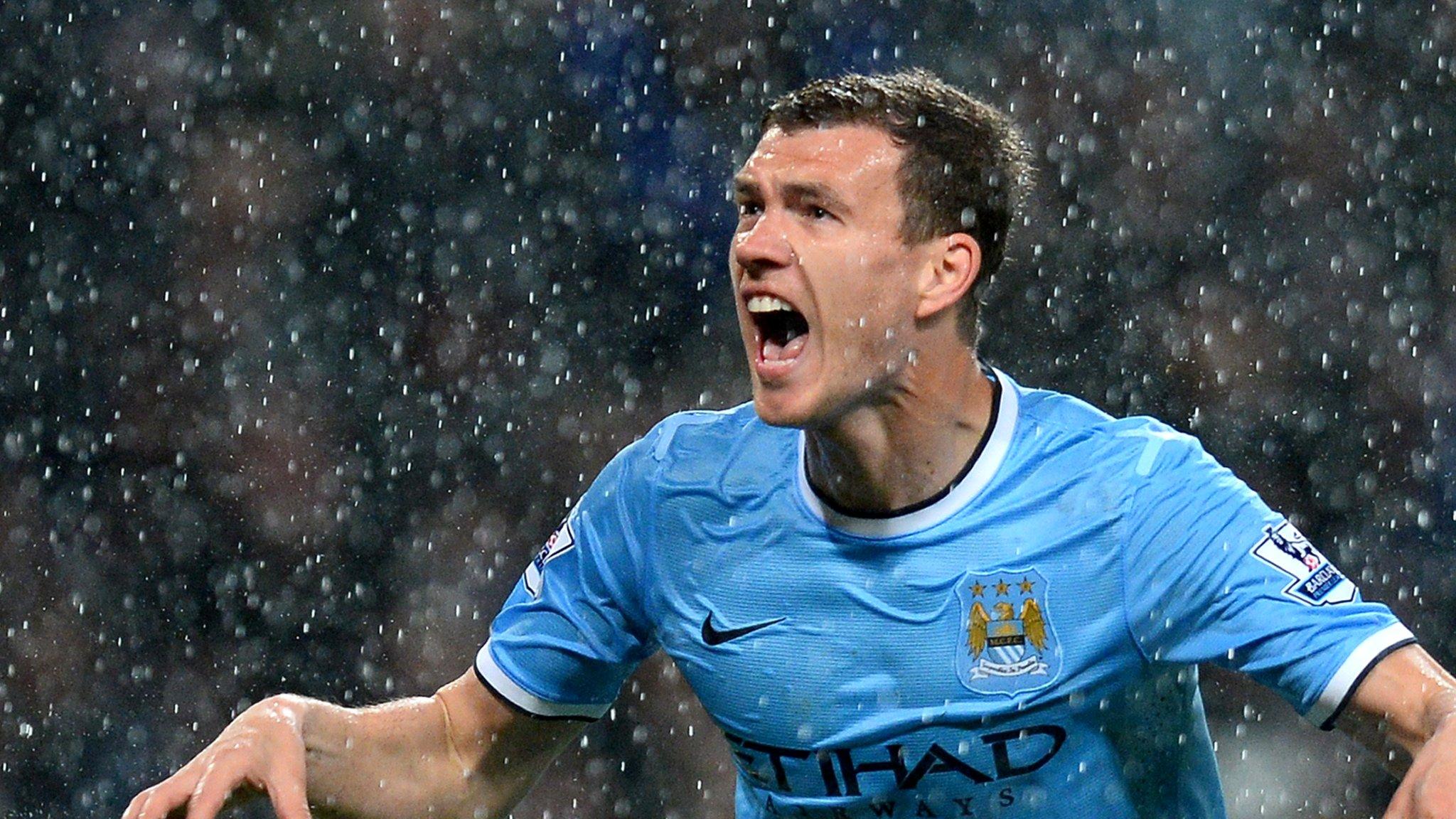 Edin Dzeko celebrates his goal