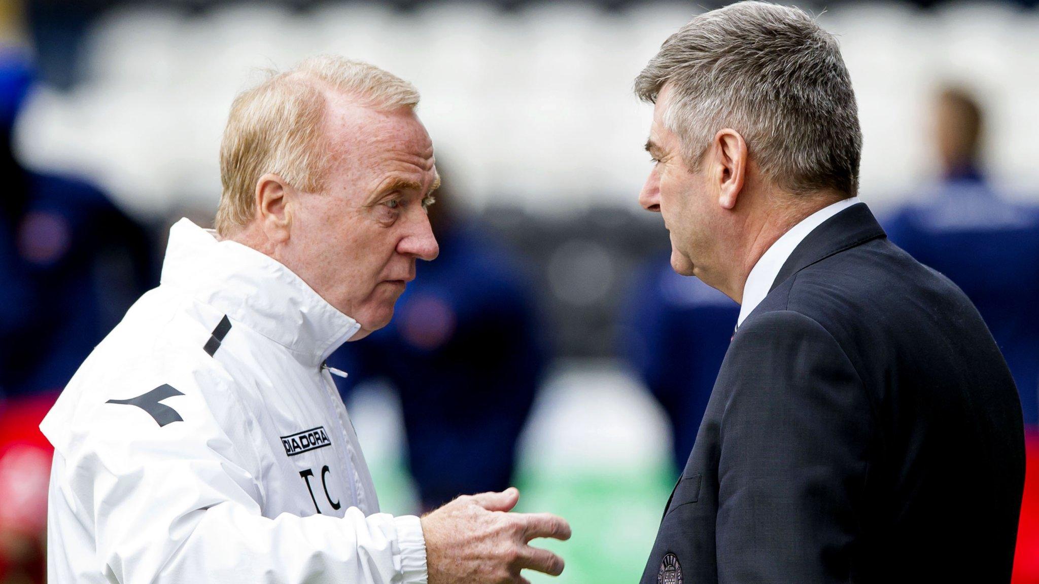 Tommy Craig in discussion with St Mirren chairman Tommy Gilmour