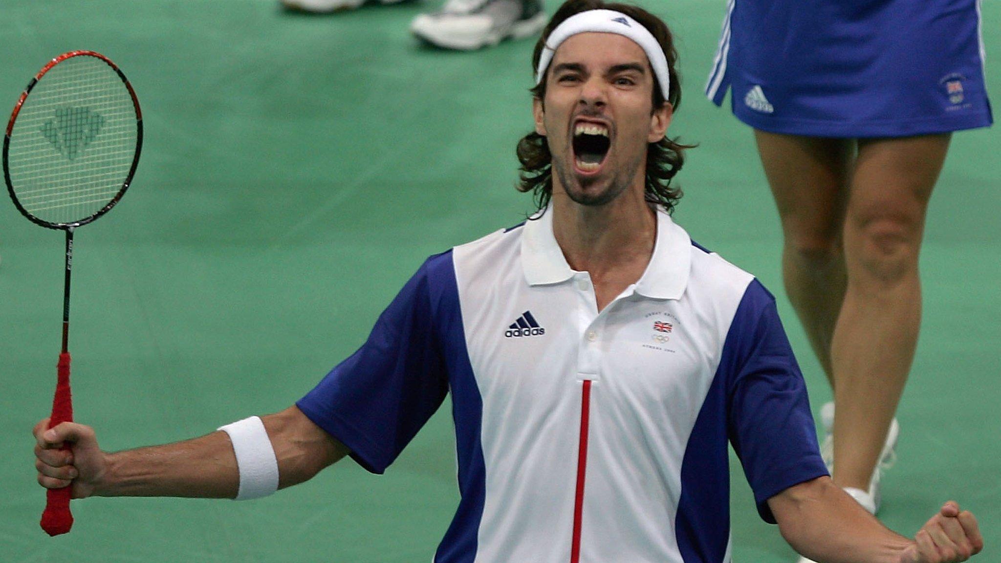 Nathan Robertson celebrates his Olympic silver medal in Athens