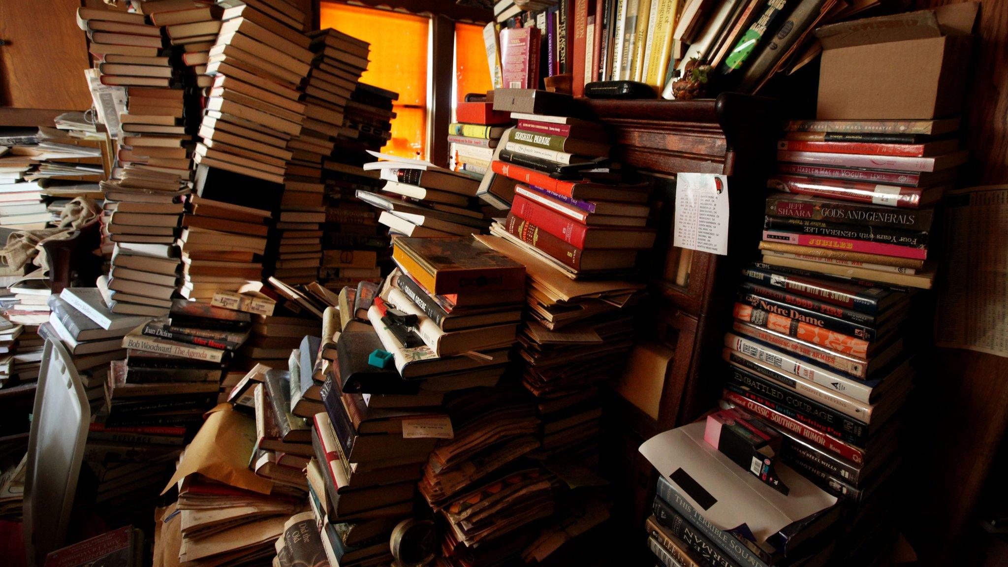 Books in a bedroom at a hoarder's home in on 8 April 8 2011, in San Diego, California.