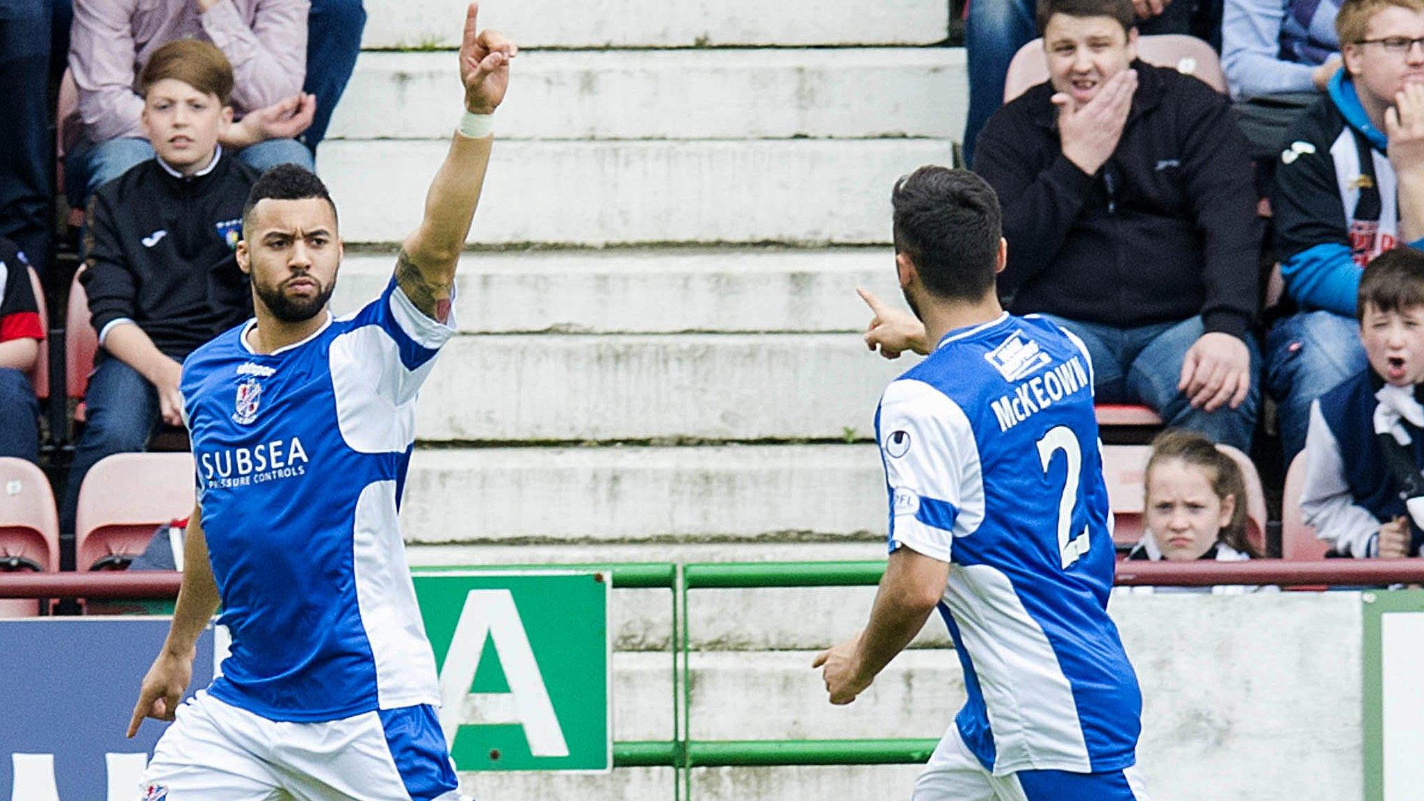 Kane Hemmings celebrates after opening the scoring