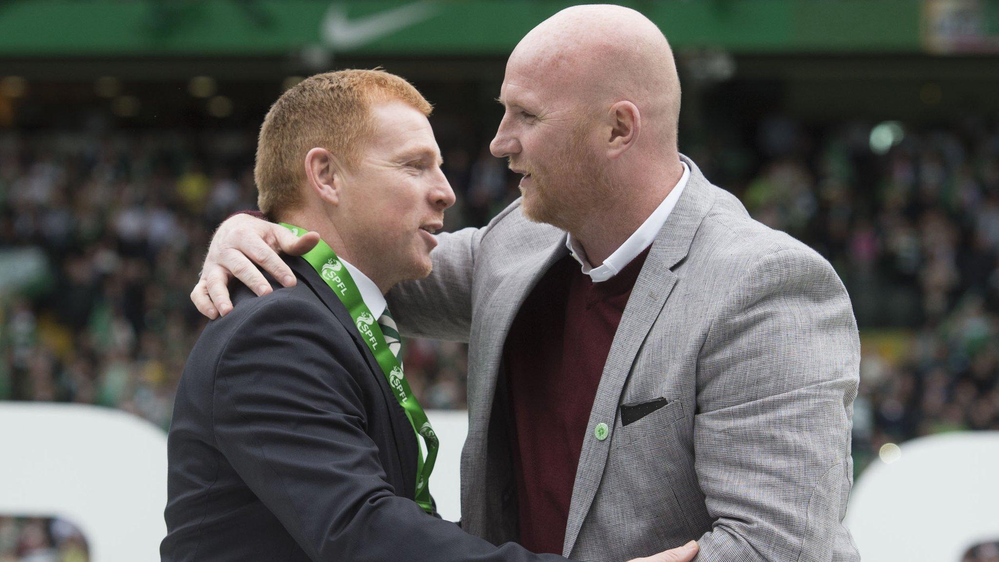 John Hartson (right) presents Neil Lennon with this season's championship medal