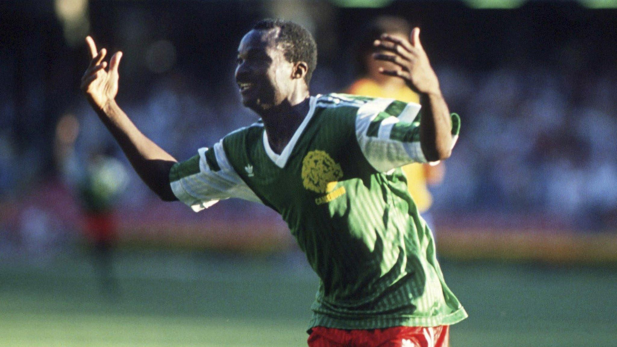 Roger Milla celebrates after scoring for Cameroon against Colombia