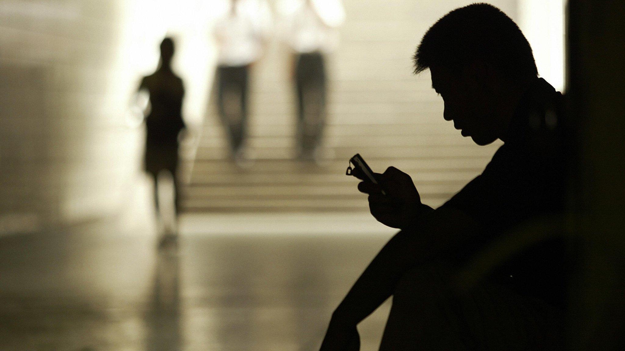 A man using mobile phone in China