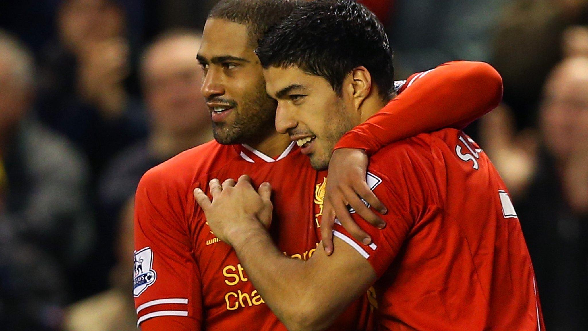 Glen Johnson (left) and Luis Suarez training while on Liverpool duty