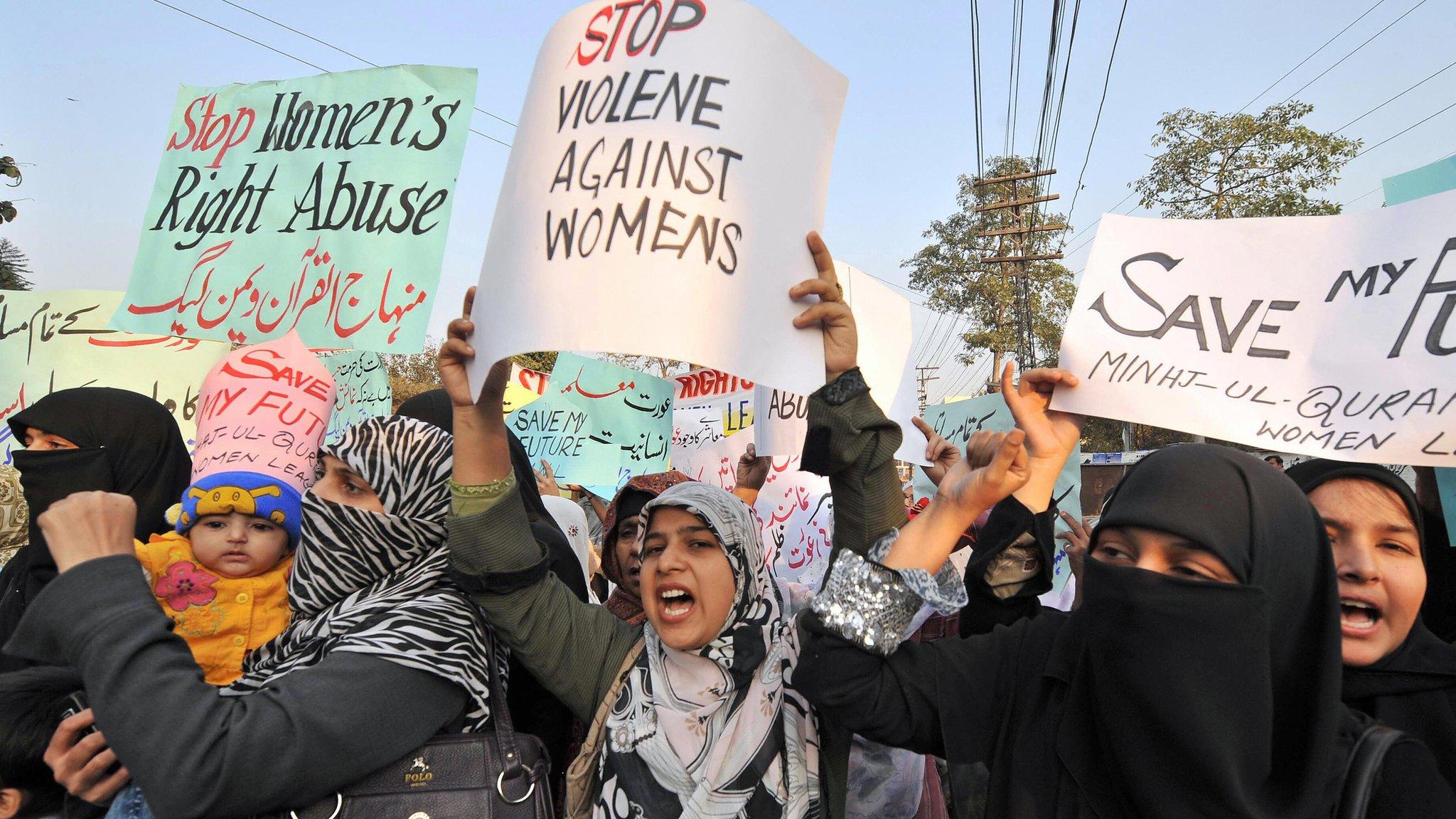 Supporters of Tehrik-e-Minhaj ul Quran, an Islamic Organisation protest against 'honour killings' of women in Lahore on November 21, 2008. Human rights lawyer Zia Awan said that more than 62,000 cases of women abused in Pakistan since the year 2000 and 159 women died in honour killings in the year to September 30