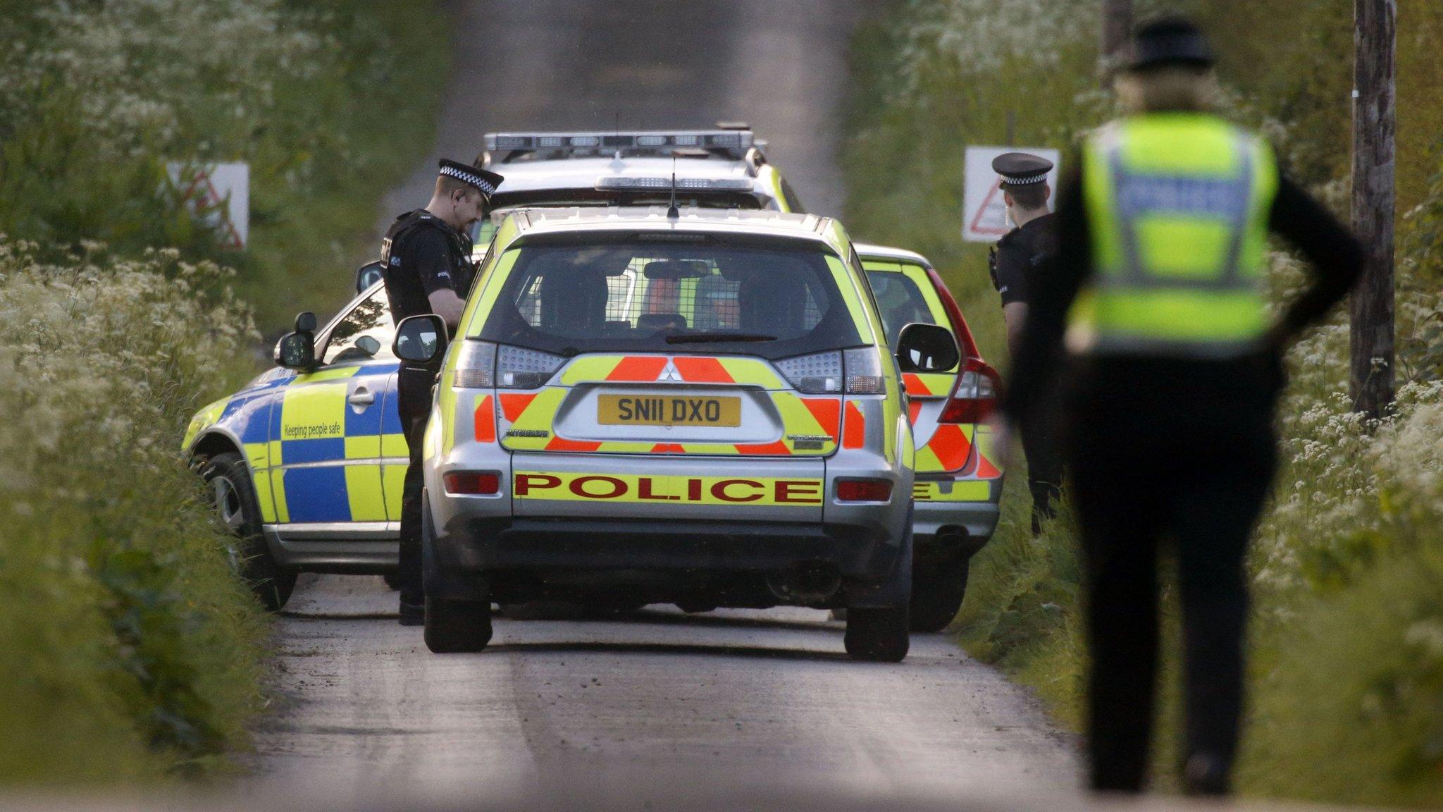 Police car near scene of the incident