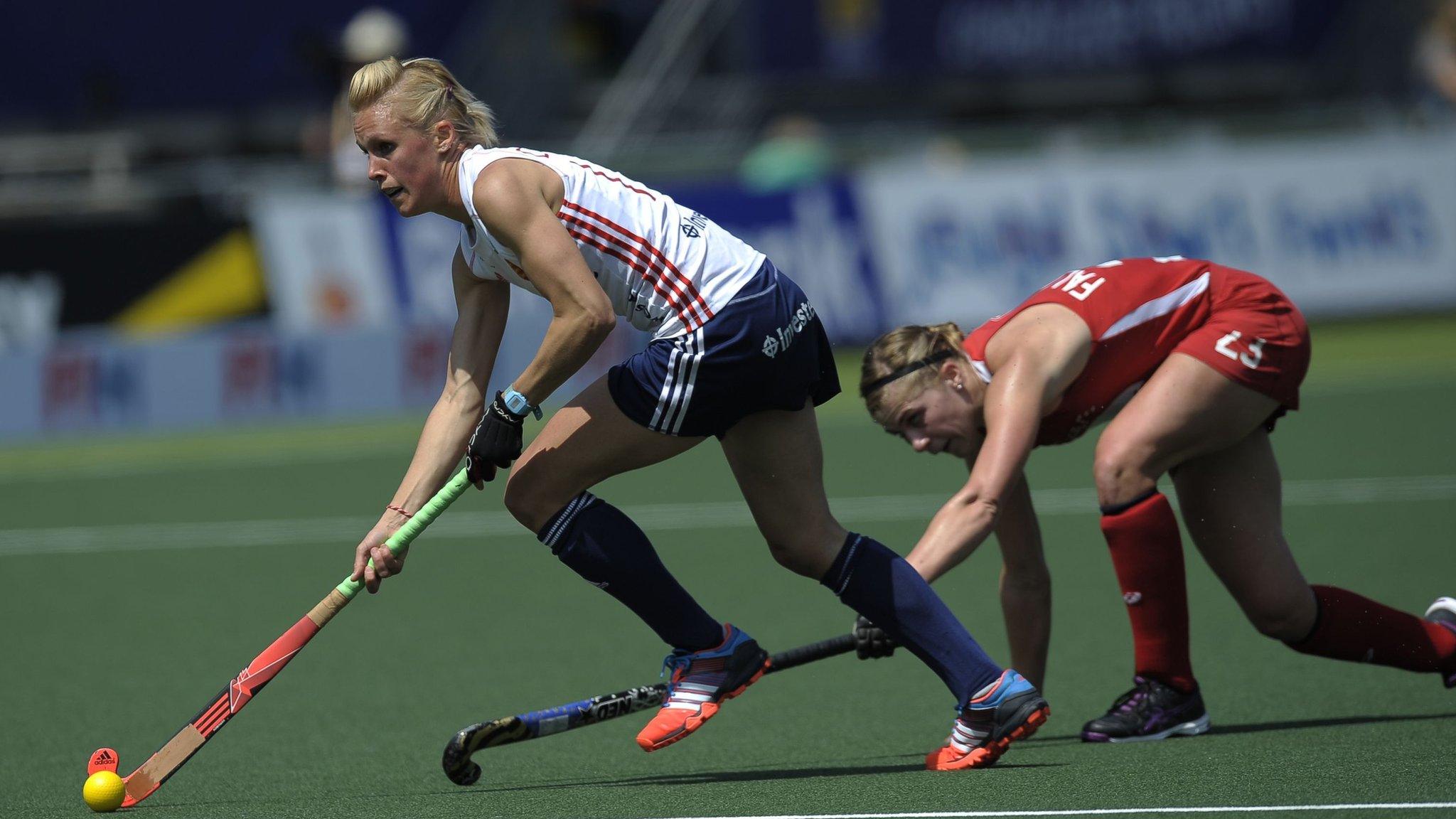 England"s Alex Danson (left) gets away from USA"s Katelyn Falgowski