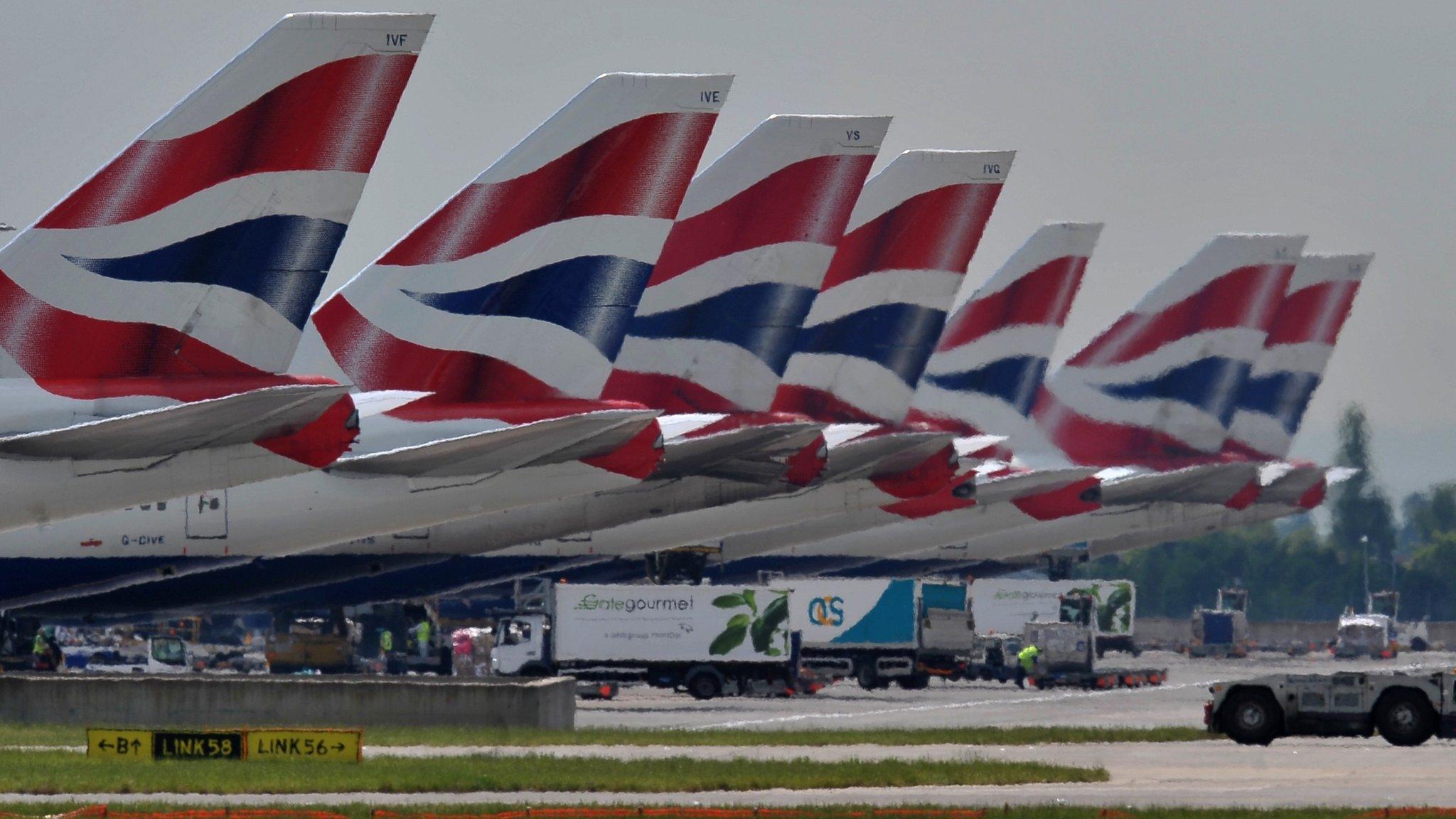 British Airways aircraft sit parked at Heathrow's Terminal 5