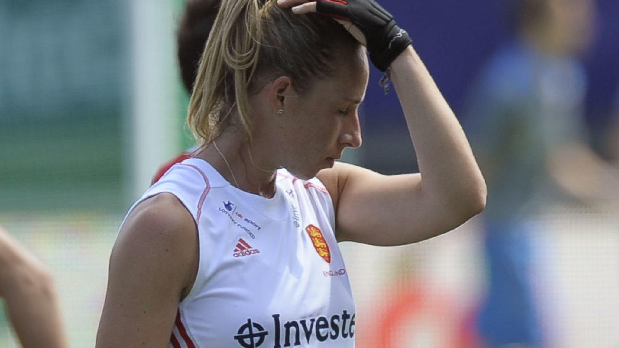 England"s Susannah Townsend (right) walks off after defeat against USA