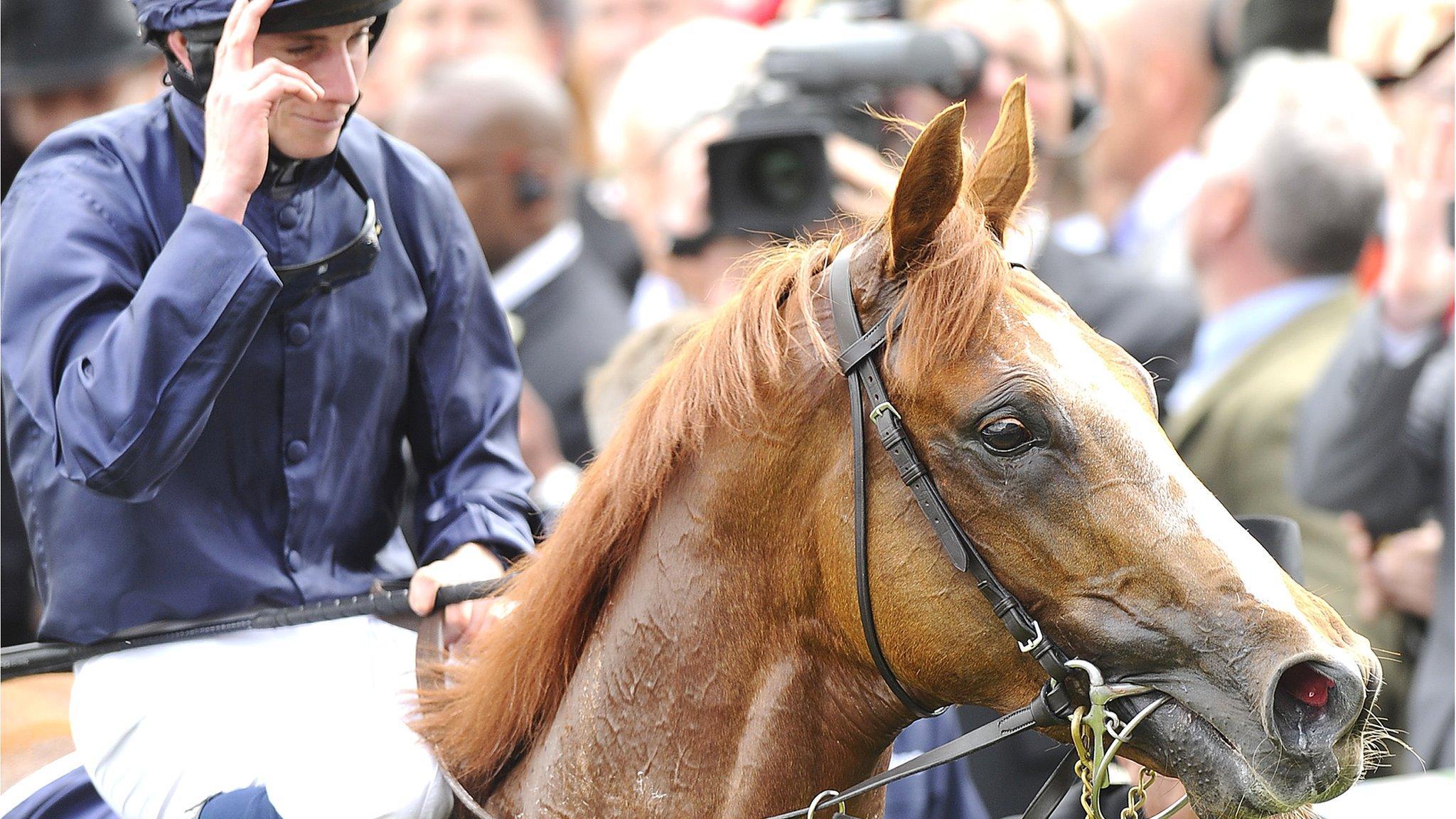 Jockey Ryan Moore celebrates his derby win with Ruler Of The World