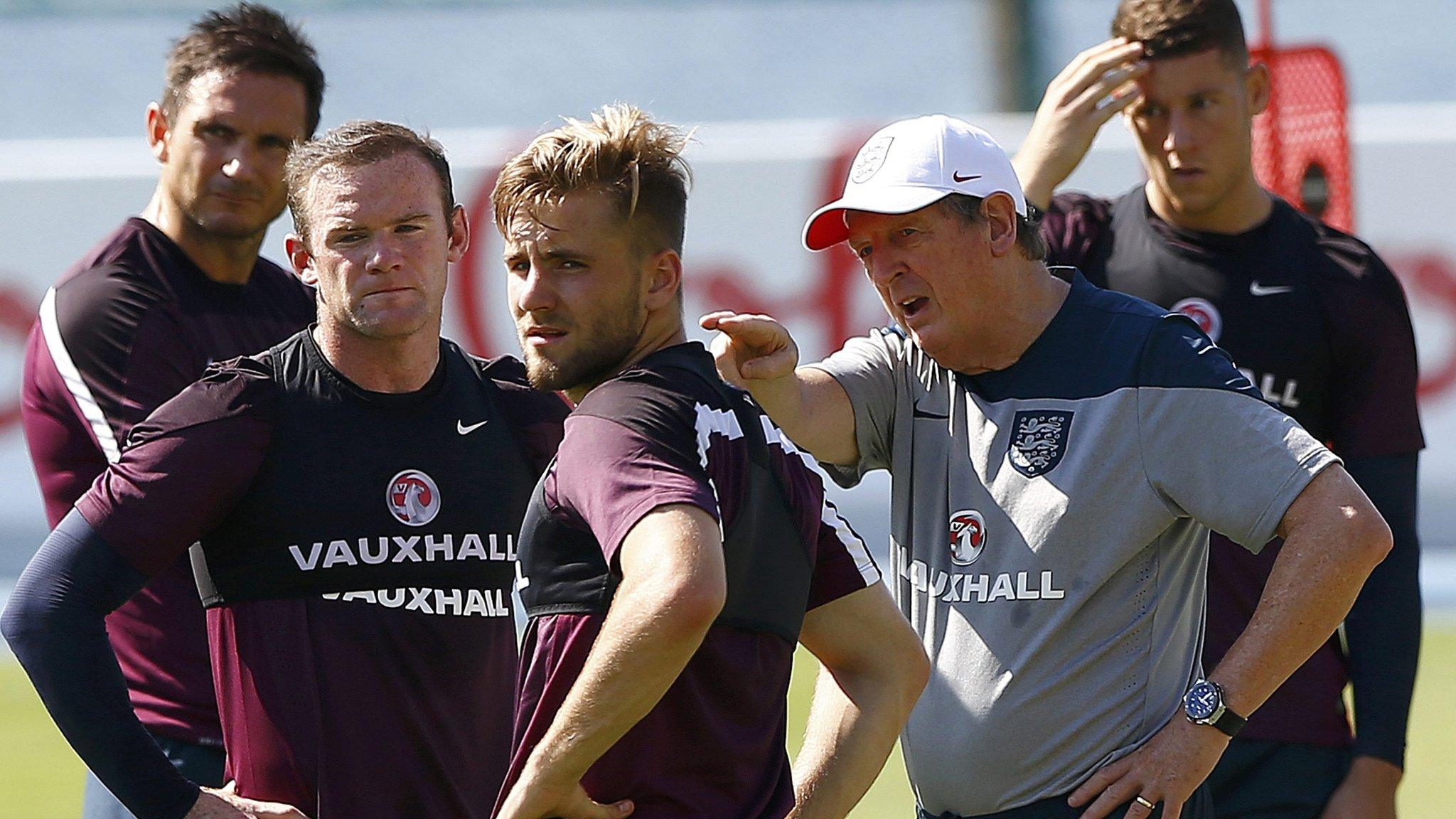 England manager Roy Hodson (second right) during training