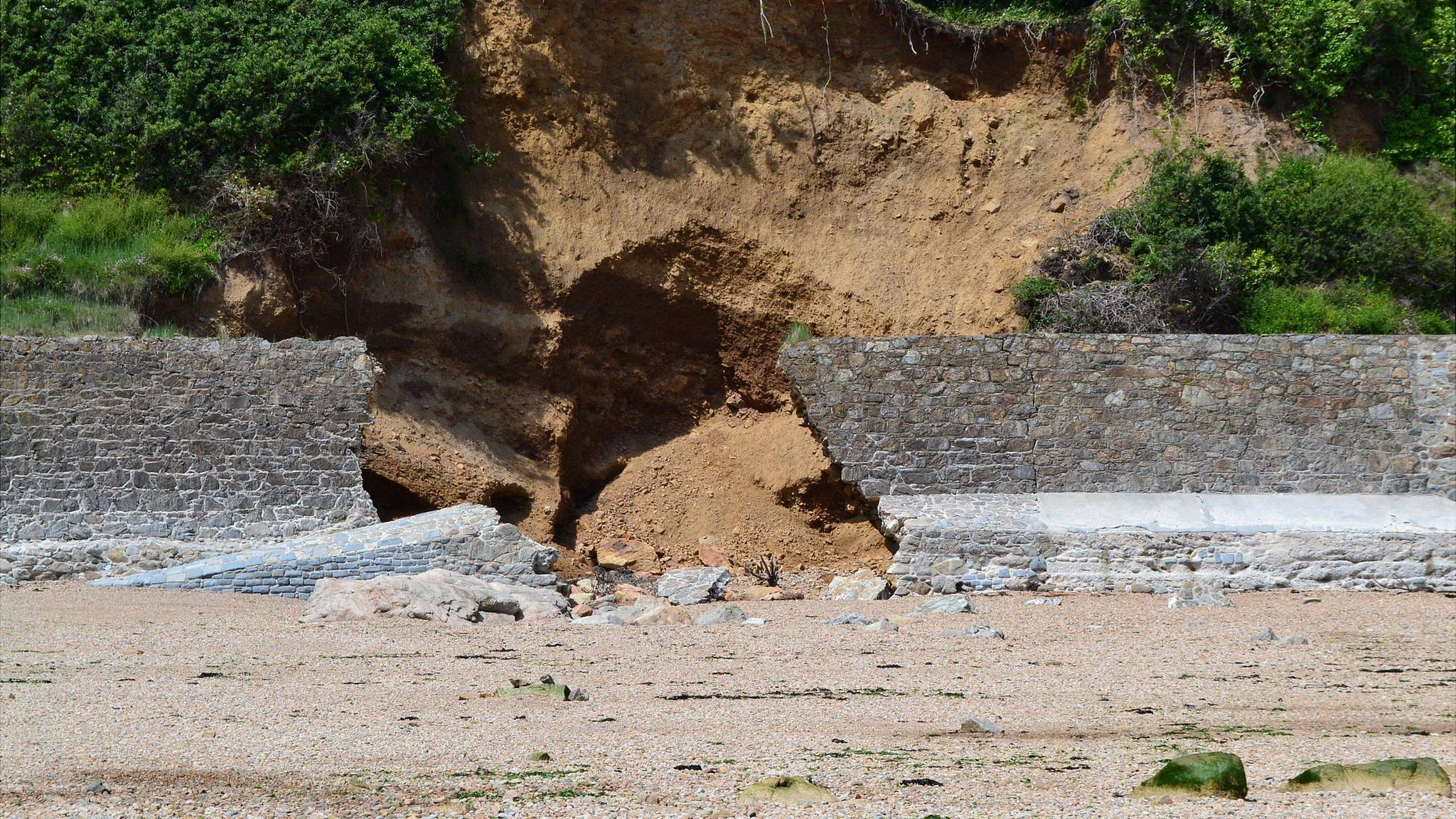 Breach in the Fermain Bay sea defences caused by storms in January