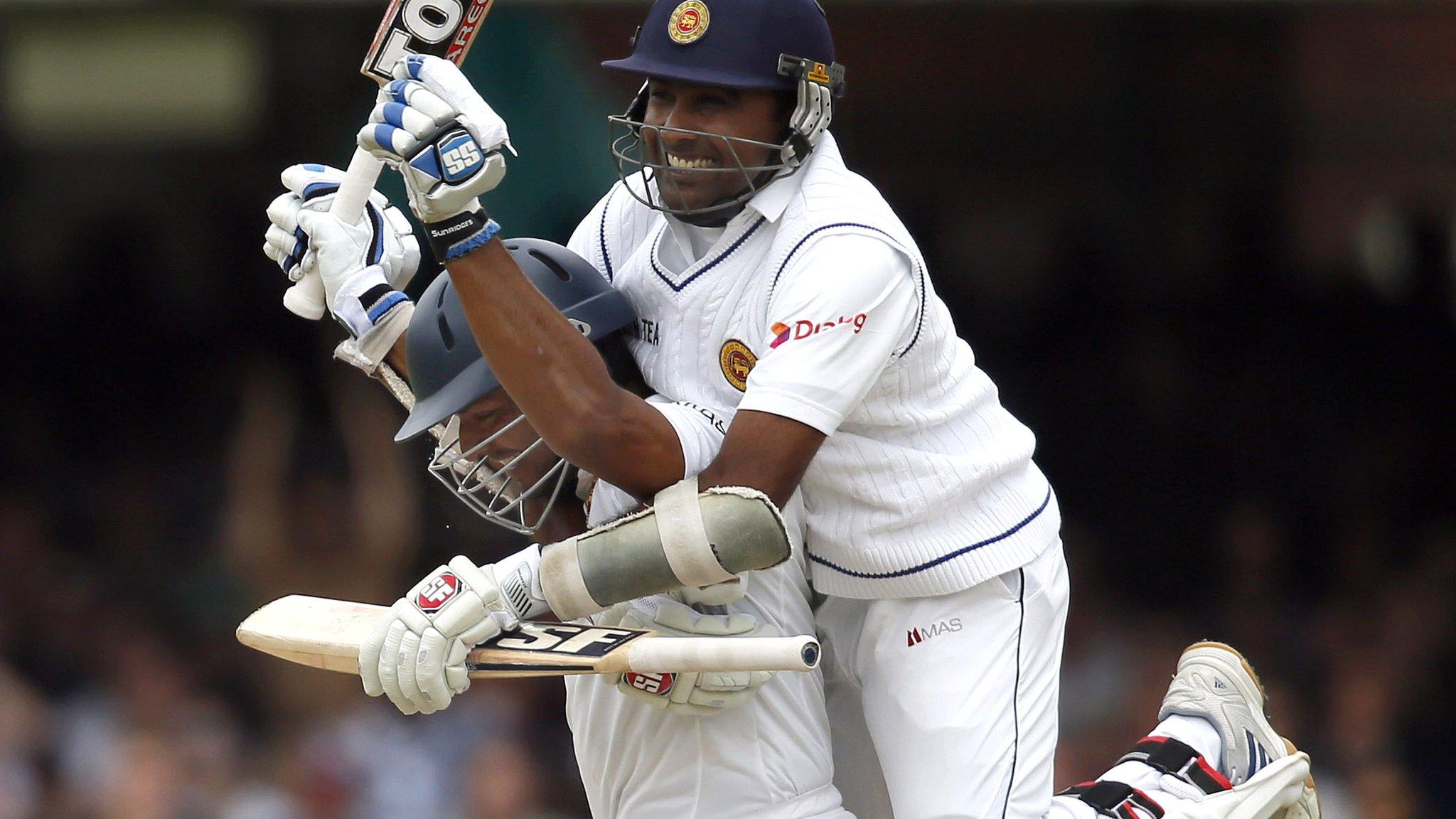 Mahela Jayawardene (right) congratulates Kumar Sangakkara on his century for Sri Lanka at Lord's