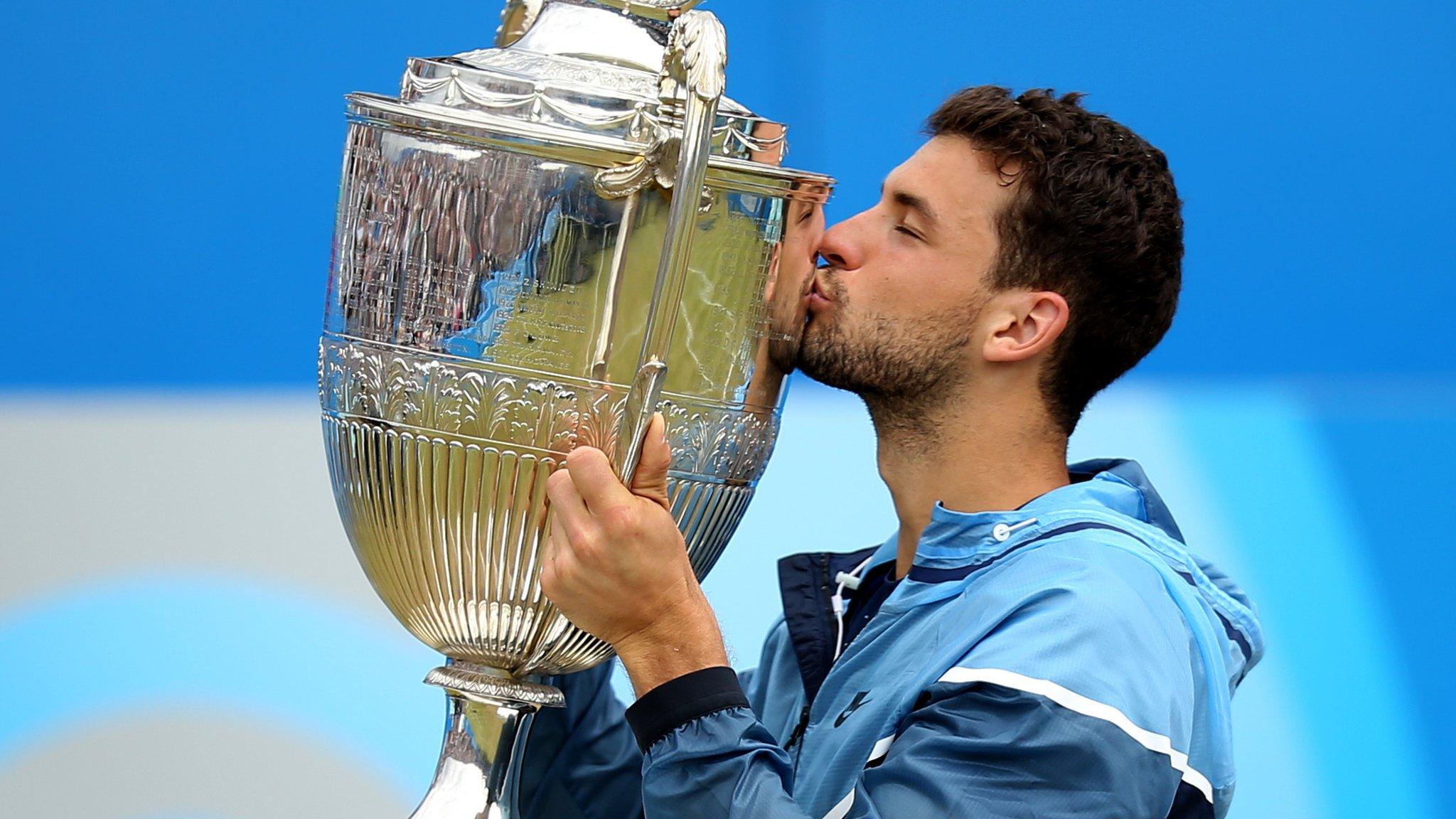 Grigor Dimitrov with the trophy at Queen's