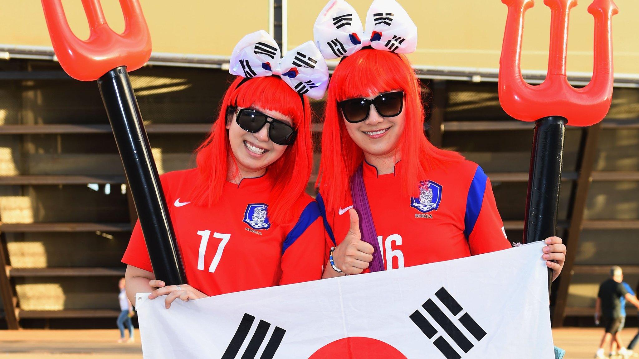 South Korea fans show their support prior to the 2014 Fifa World Cup Brazil Group H match between Russia and South Korea at Arena Pantanal