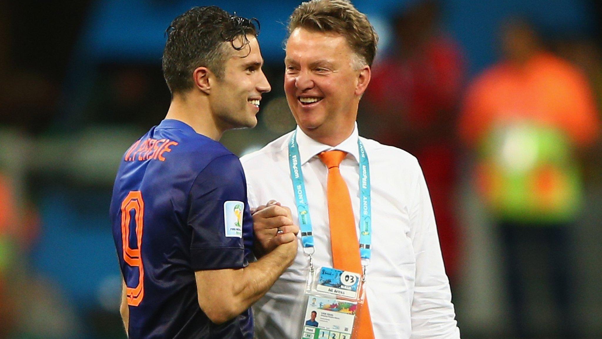 Louis van Gaal and Robin van Persie celebrate victory after defeating Spain 5-1