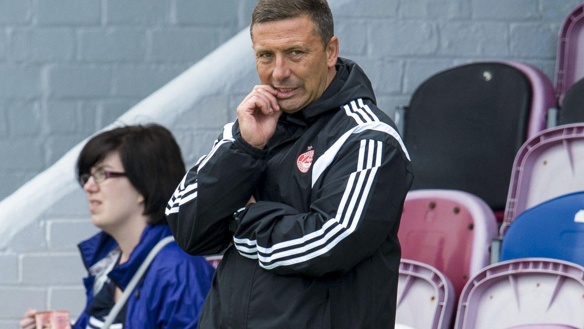 Aberdeen manager Derek McInnes with Barry Robson before the friendly with Arbroath