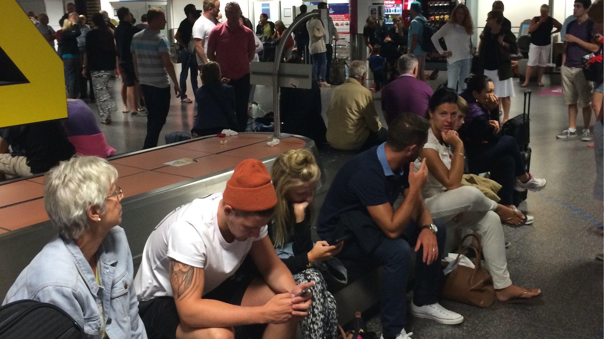 Passengers waiting at Gatwick
