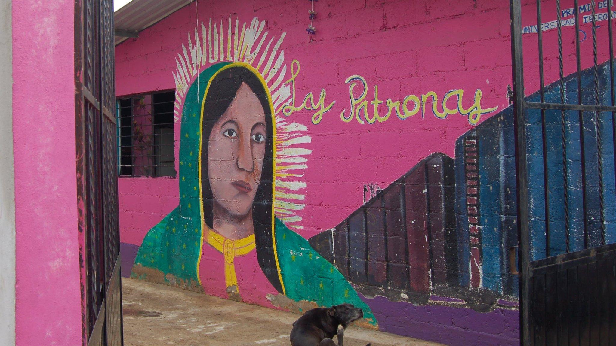 A mural of Las Patronas is painted on wall of their kitchen