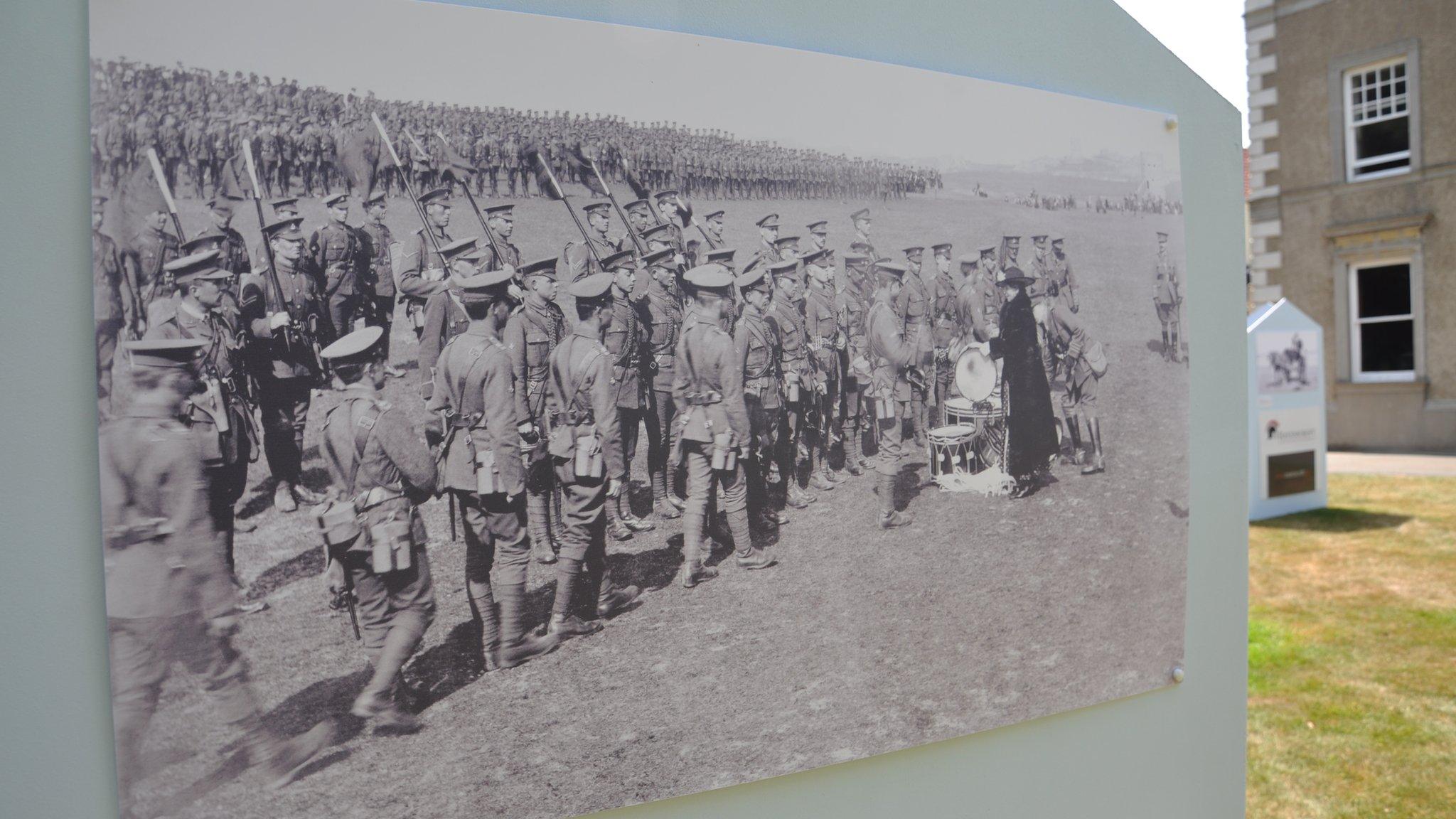 Priaulx Library WW1 exhibition: Royal Guernsey Light Infantry being presented with band instruments