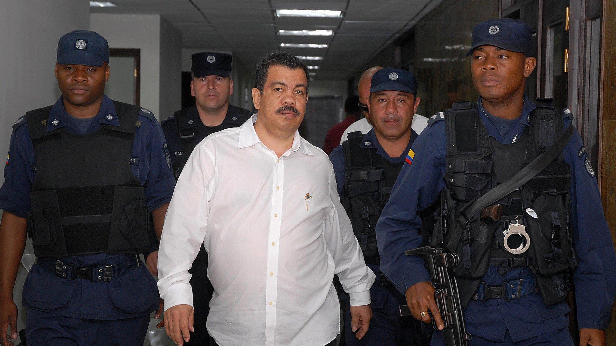 Diego Murillo surrounded by police officers