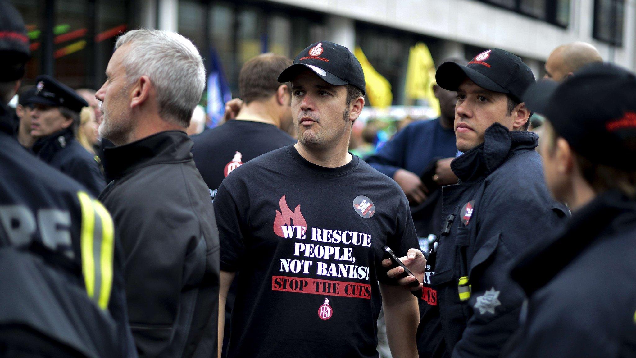 Firefighters taking part in a rally in July 2014