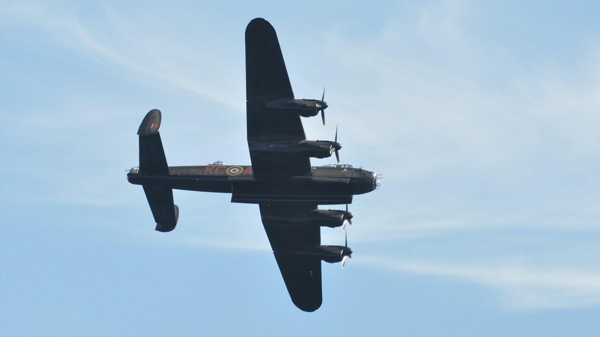 Battle of Britain Memorial Flight Lancaster Bomber flying over Guernsey