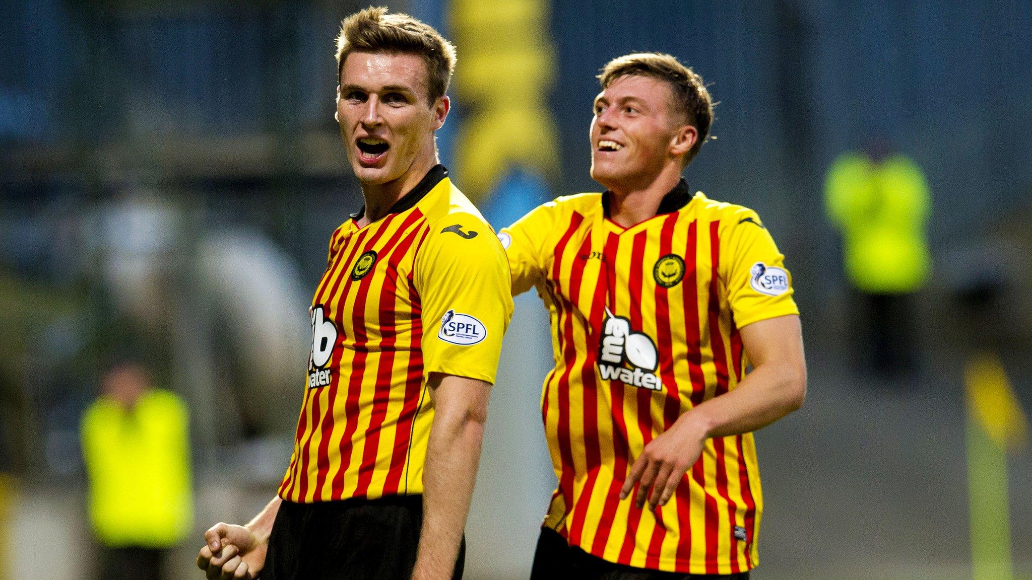 Partick Thistle players Stephen O'Donnell and Gary Fraser celebrate