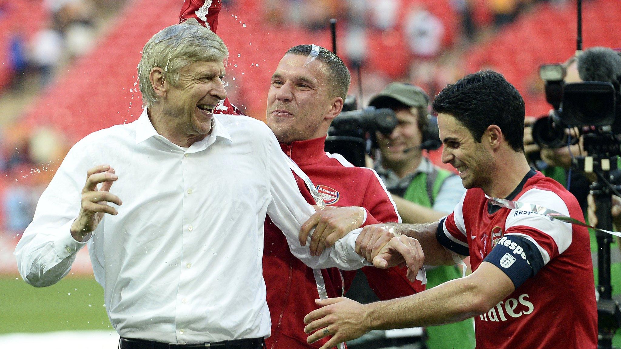 Arsenal manager Arsene Wenger (left) celebrates FA Cup win