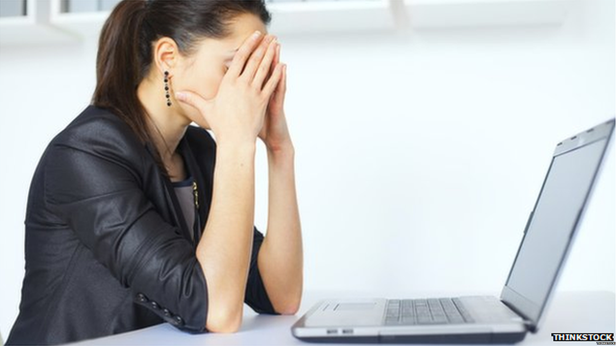 Woman looking at computer