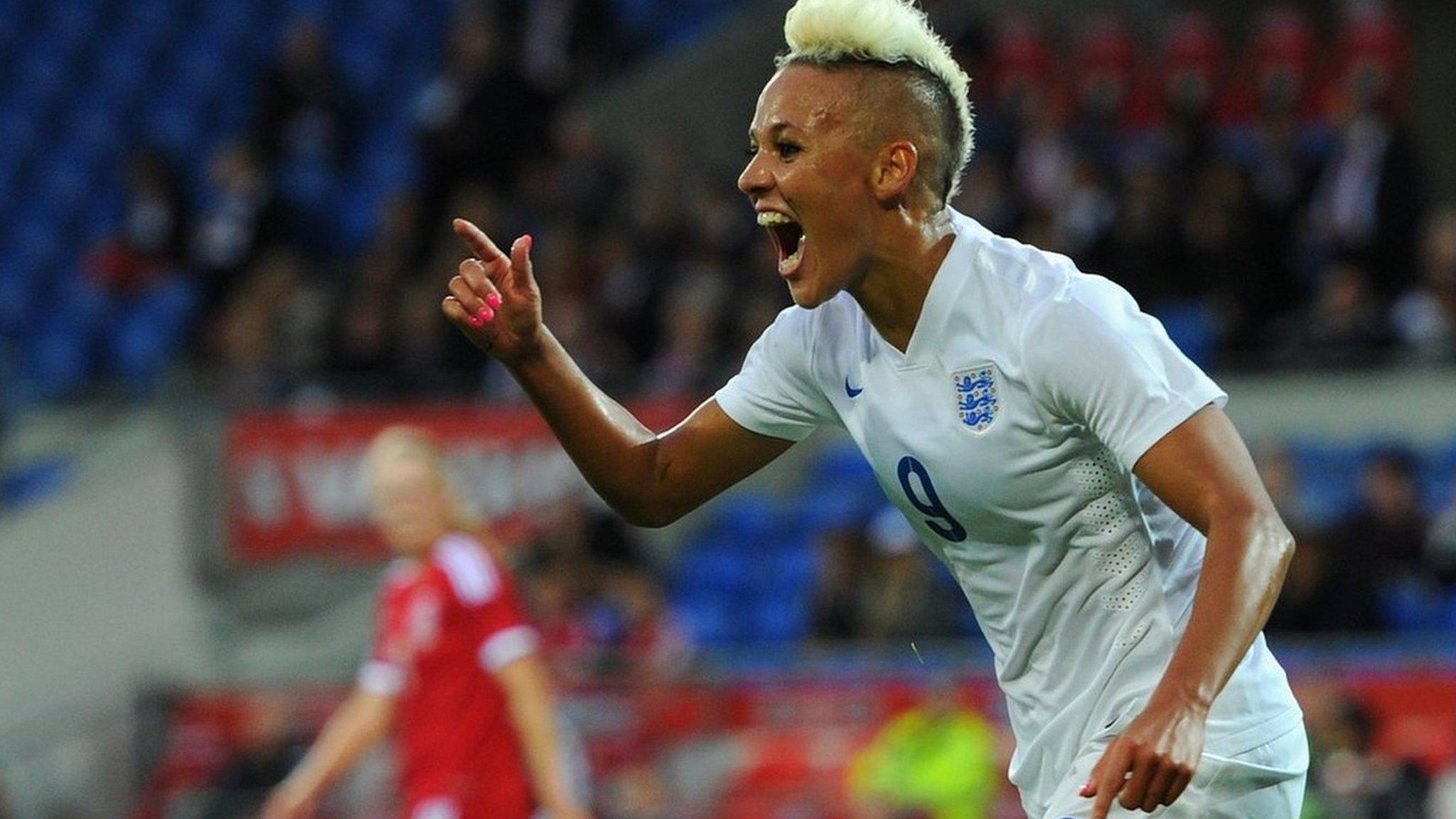 England forward Lianne Sanderson celebrates after scoring