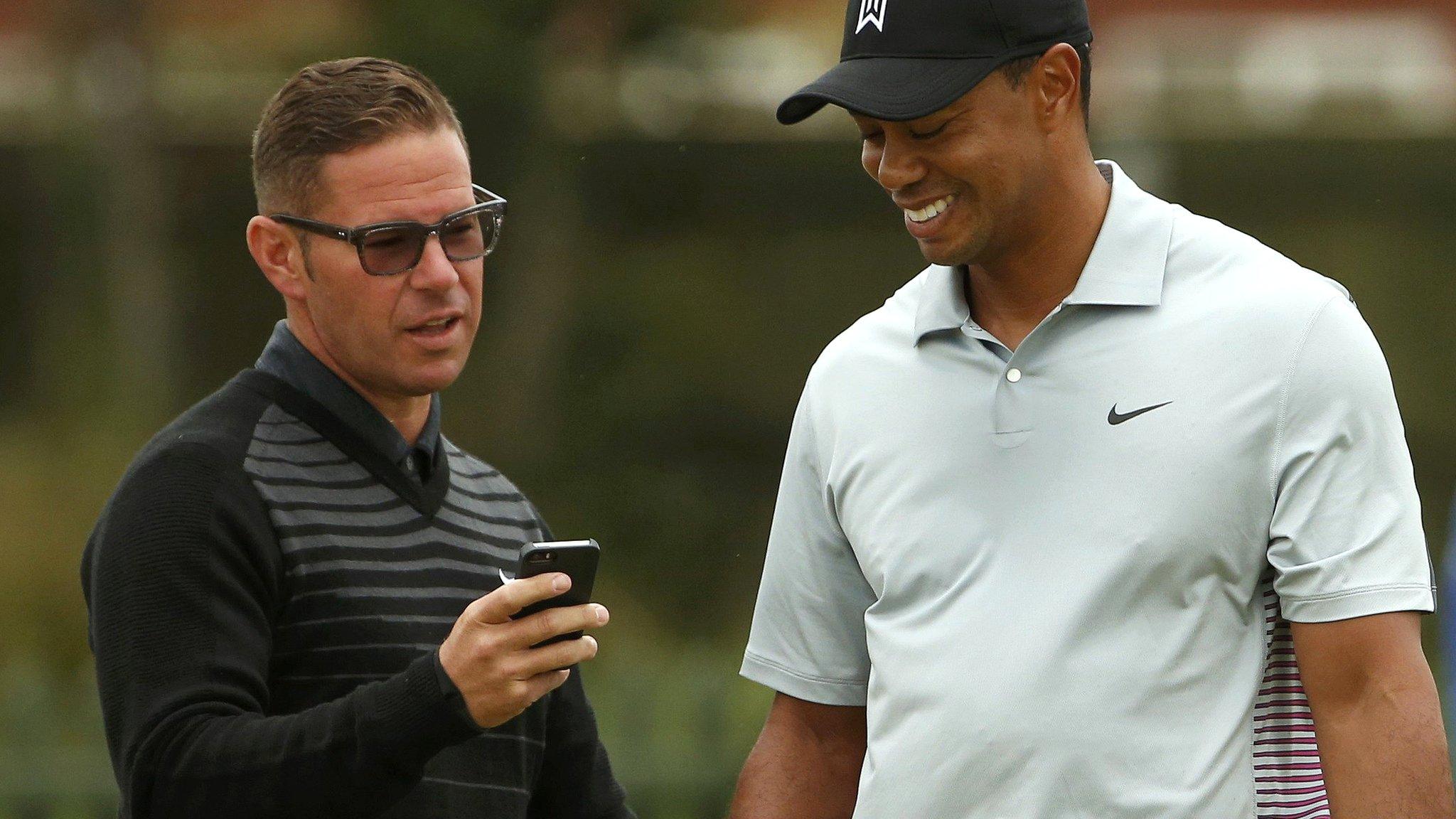 Tiger Woods has worked with coach Sean Fley (left) since 2010
