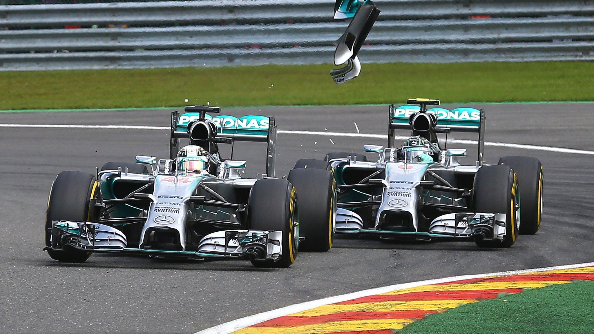 Nico Rosberg collides with Lewis Hamilton at the Belgian Grand Prix