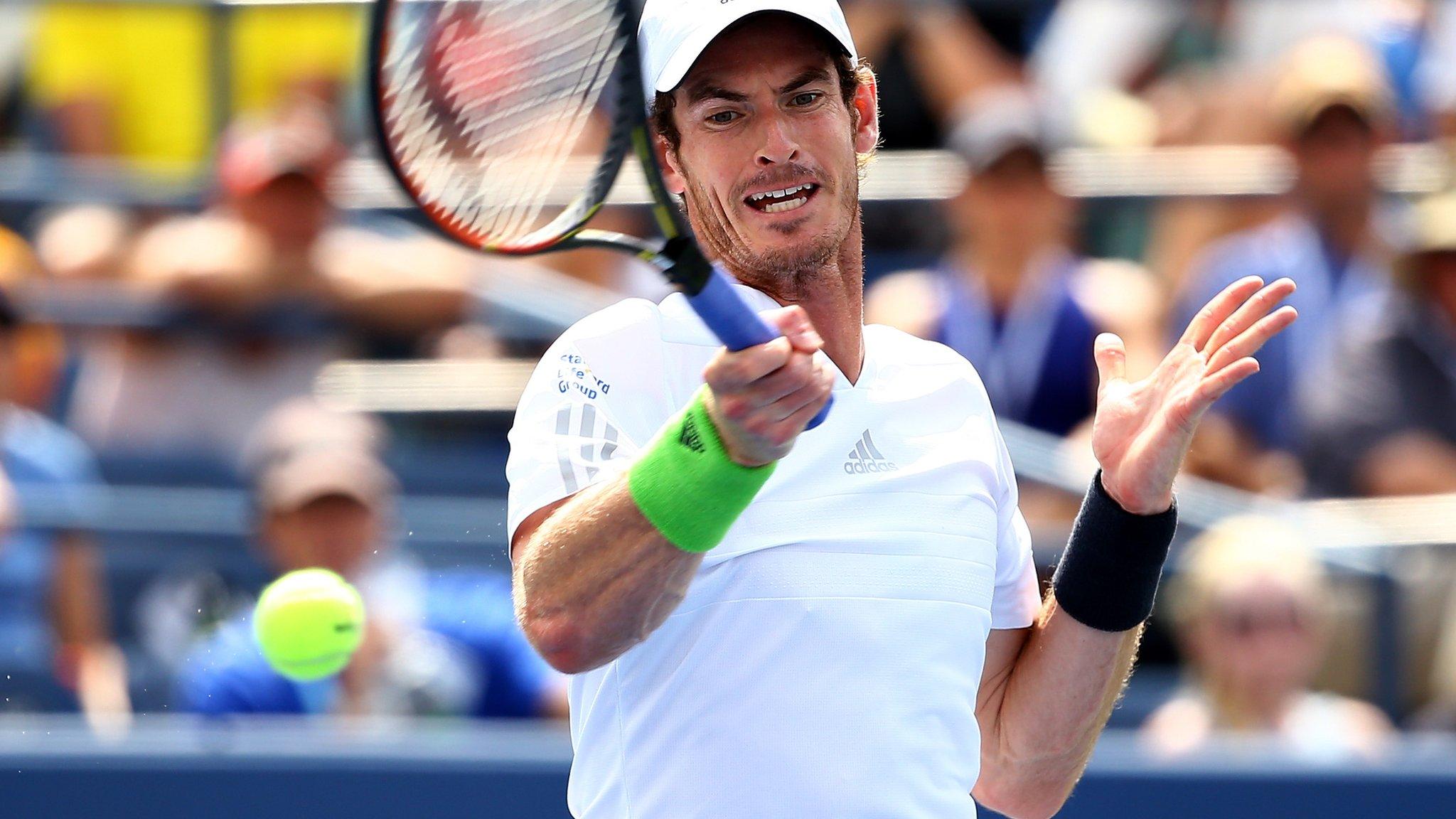 Andy Murray stretches for a forehand at the US Open 2014