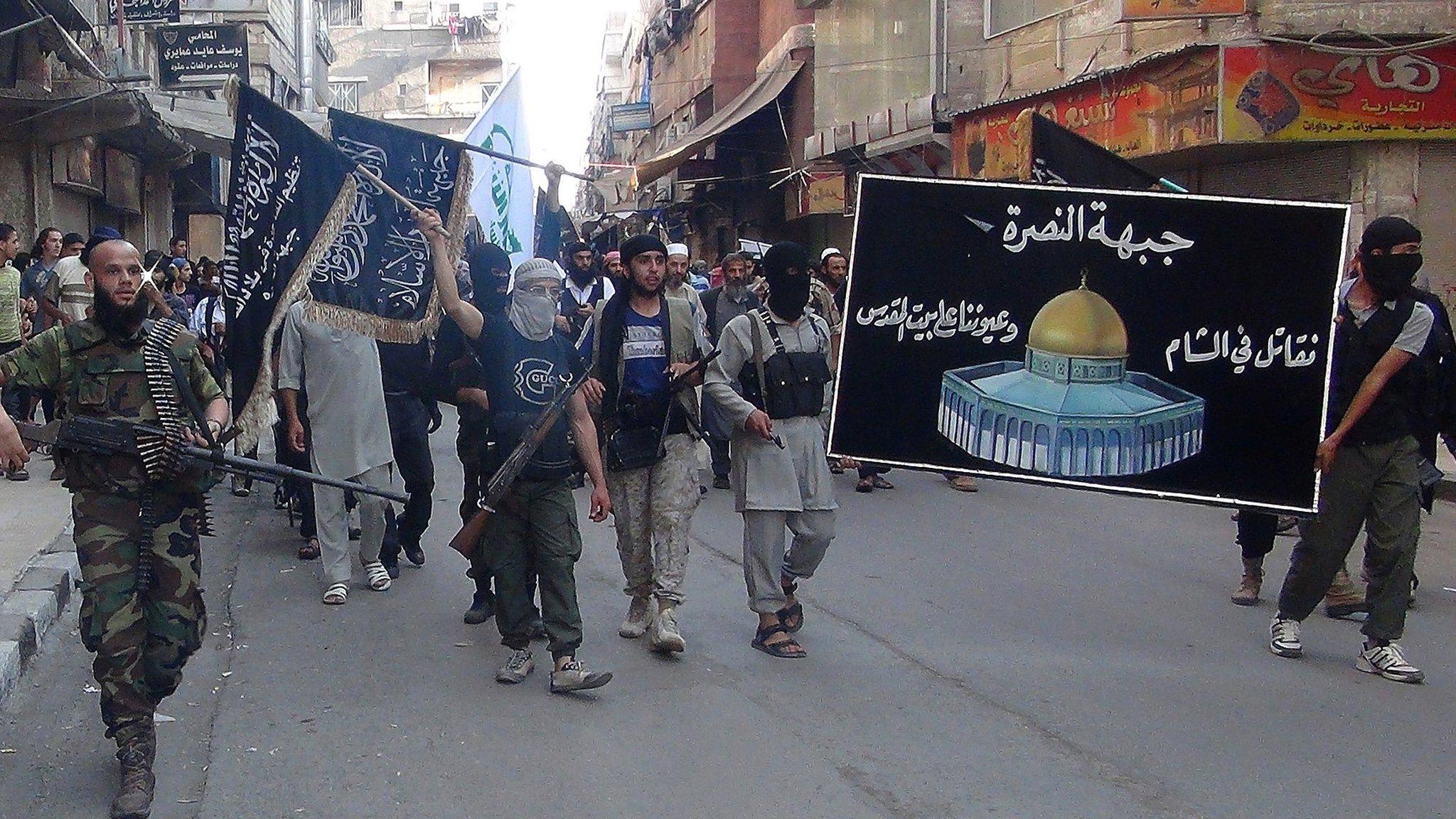 Islamic fighters from the al-Qaida group in the Levant, Al-Nusra Front in Yarmuk Palestinian refugee camp, south of Damascus,