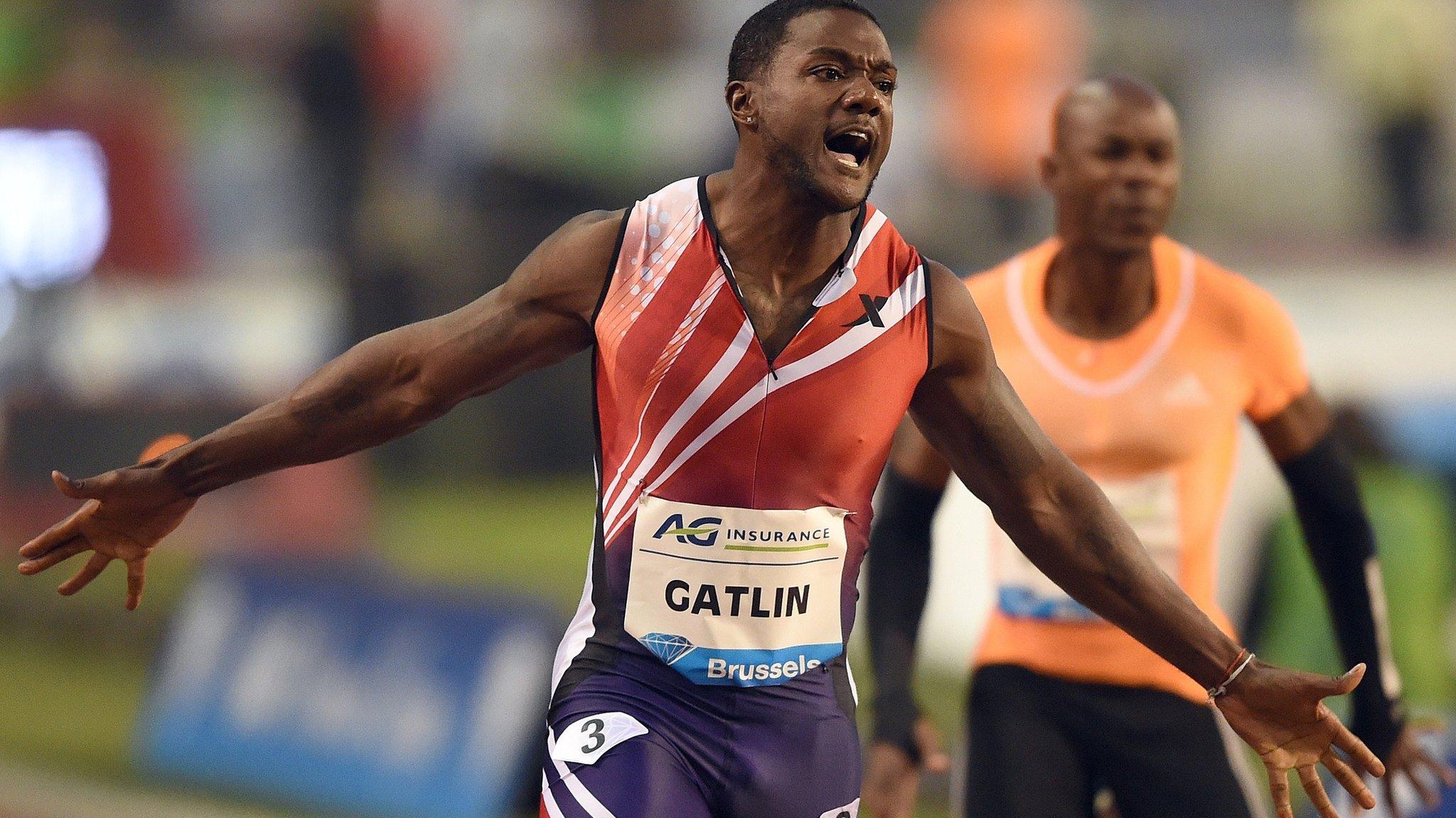 US athlete Justin Gatlin crosses the finish line