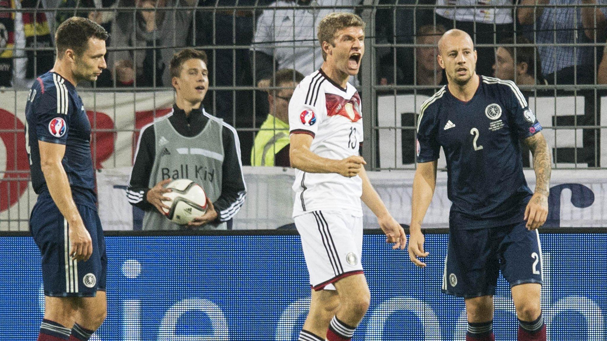 Thomas Muller celebrates after scoring for Germany against Scotland