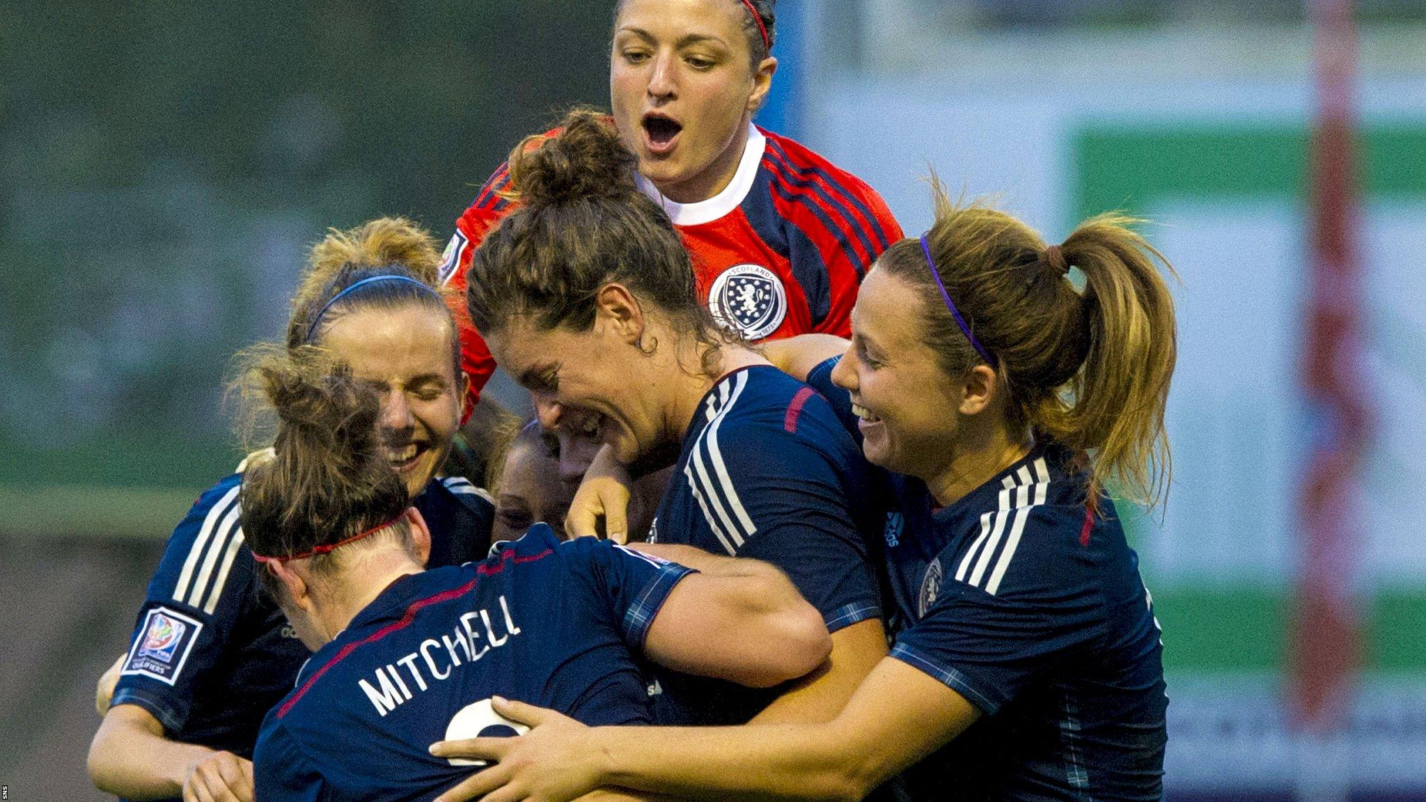 Scotland's women celebrate after making it 9-0 against the Faroe Islands