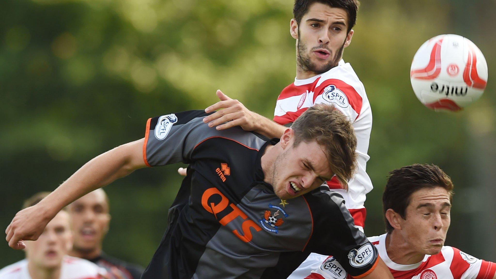 Kilmarnock's Robbie Muihead is squeezed out by Stephen Hendrie (top) and Danny Redmond (right)