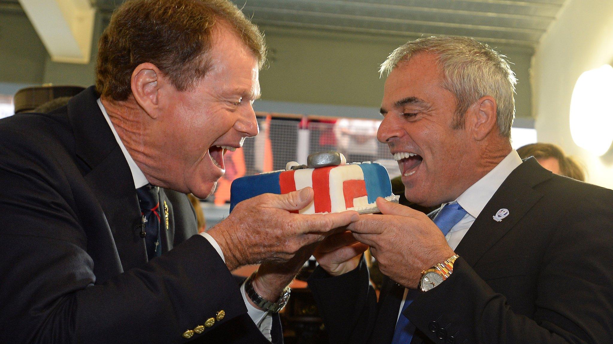 Tom Watson (left) and Paul McGinley share a Ryder Cup themed cake