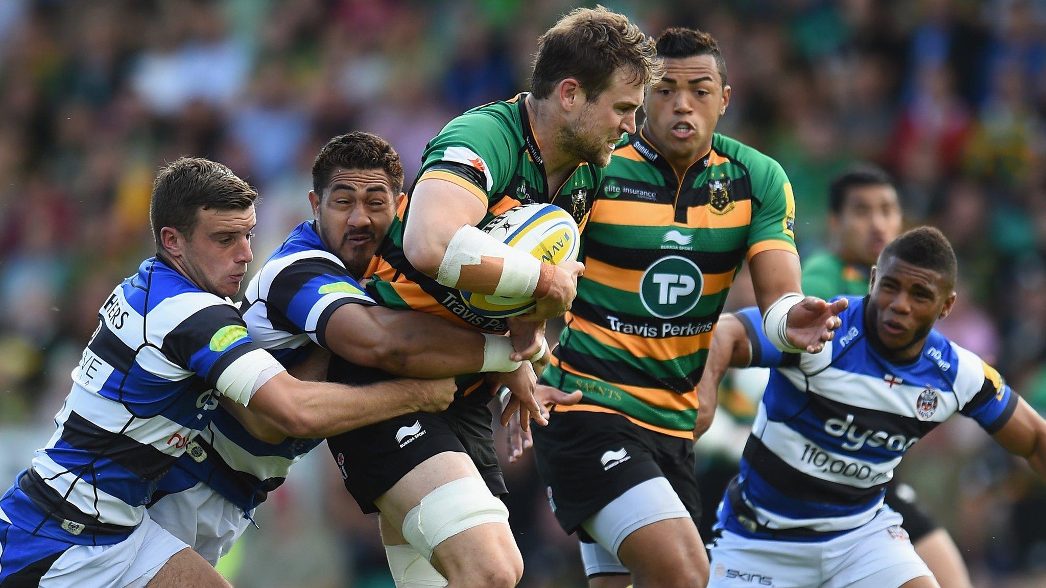 Northampton's Jon Fisher tackled against Bath