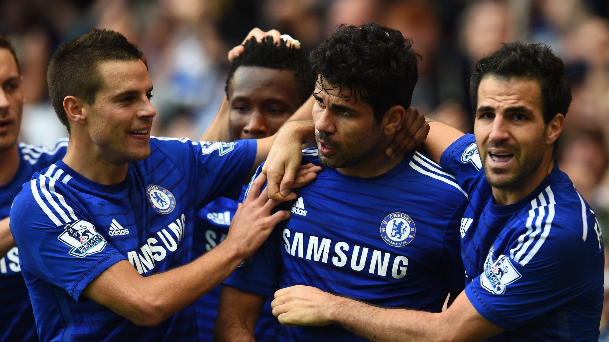 Diego Costa celebrates with his Chelsea team-mates