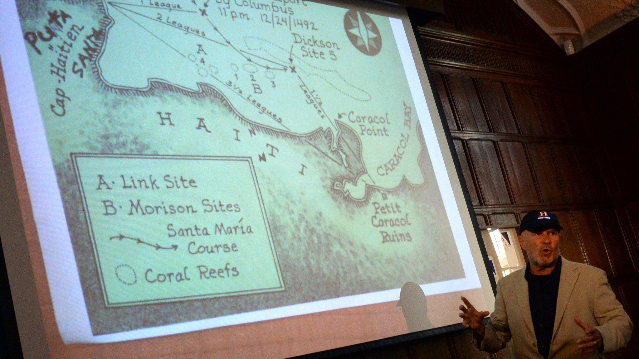 Maritime archaeological investigator Barry Clifford uses slides as he talks about discovering what he believed to be Christopher Columbus's ship at a news conference on 14 May, 2014 in New York