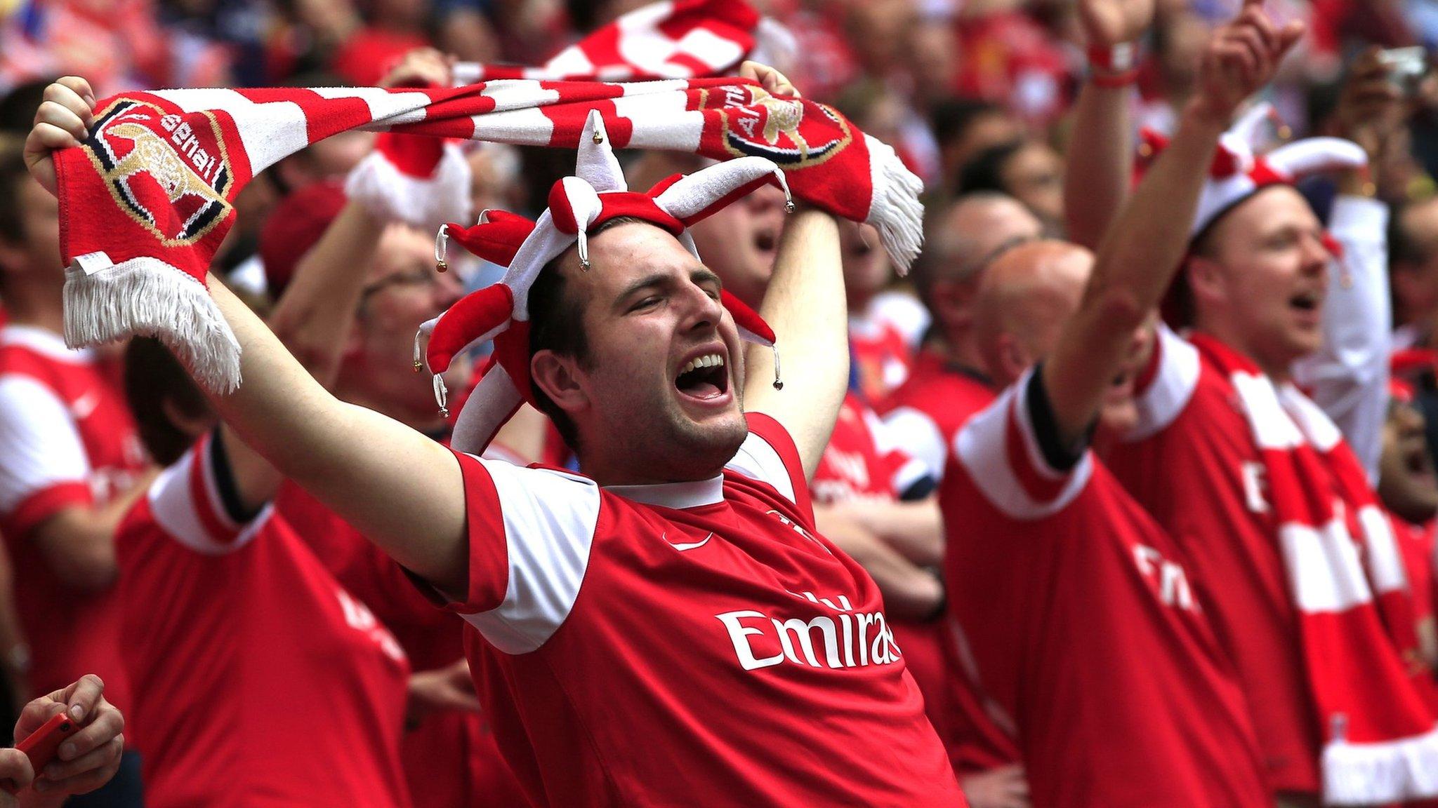 Arsenal fans celebrate their team winning the FA Cup