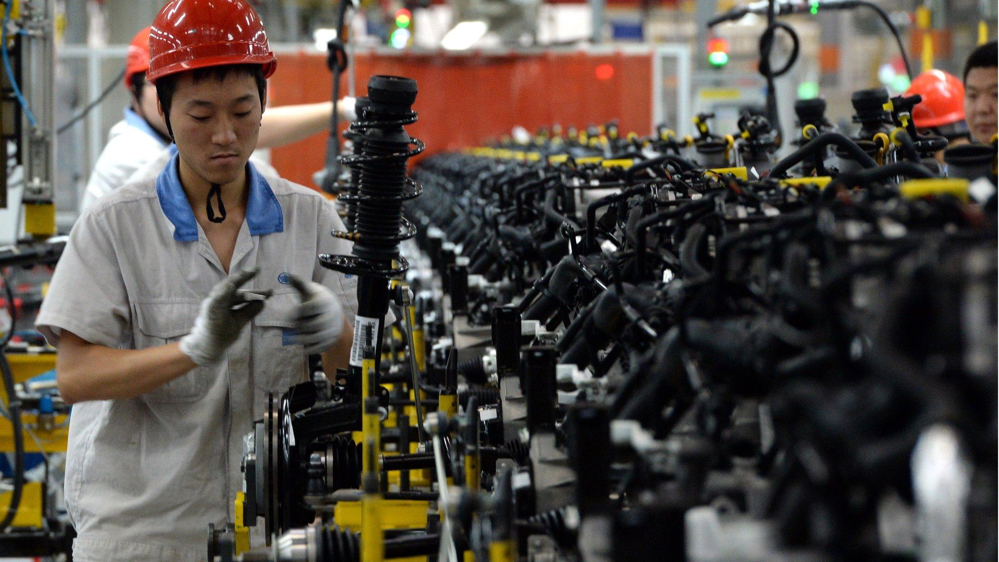 Chinese auto workers at the FAW-Volkswagen plant in Chengdu, China