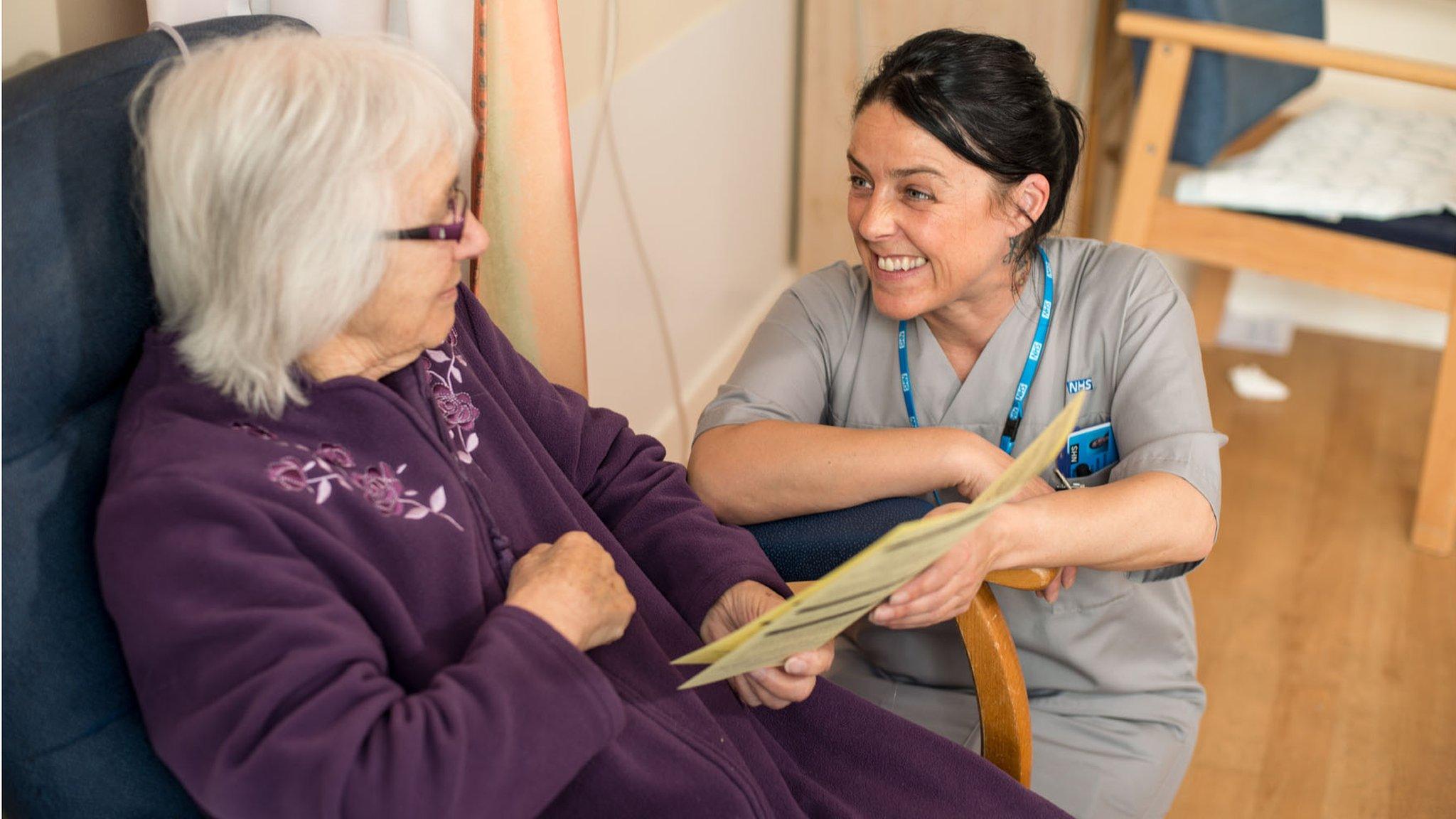 Nurse with older patient