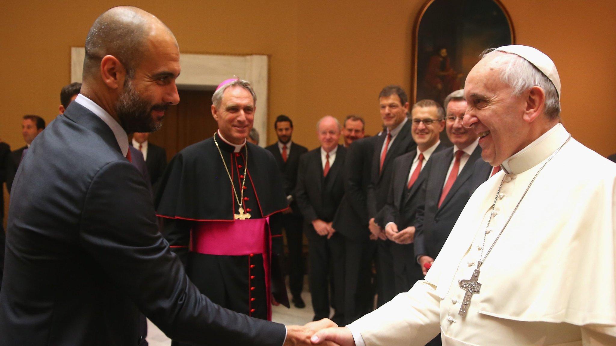 Bayern Munich players presented Pope Francis with a signed shirt during a private audience on Wednesday