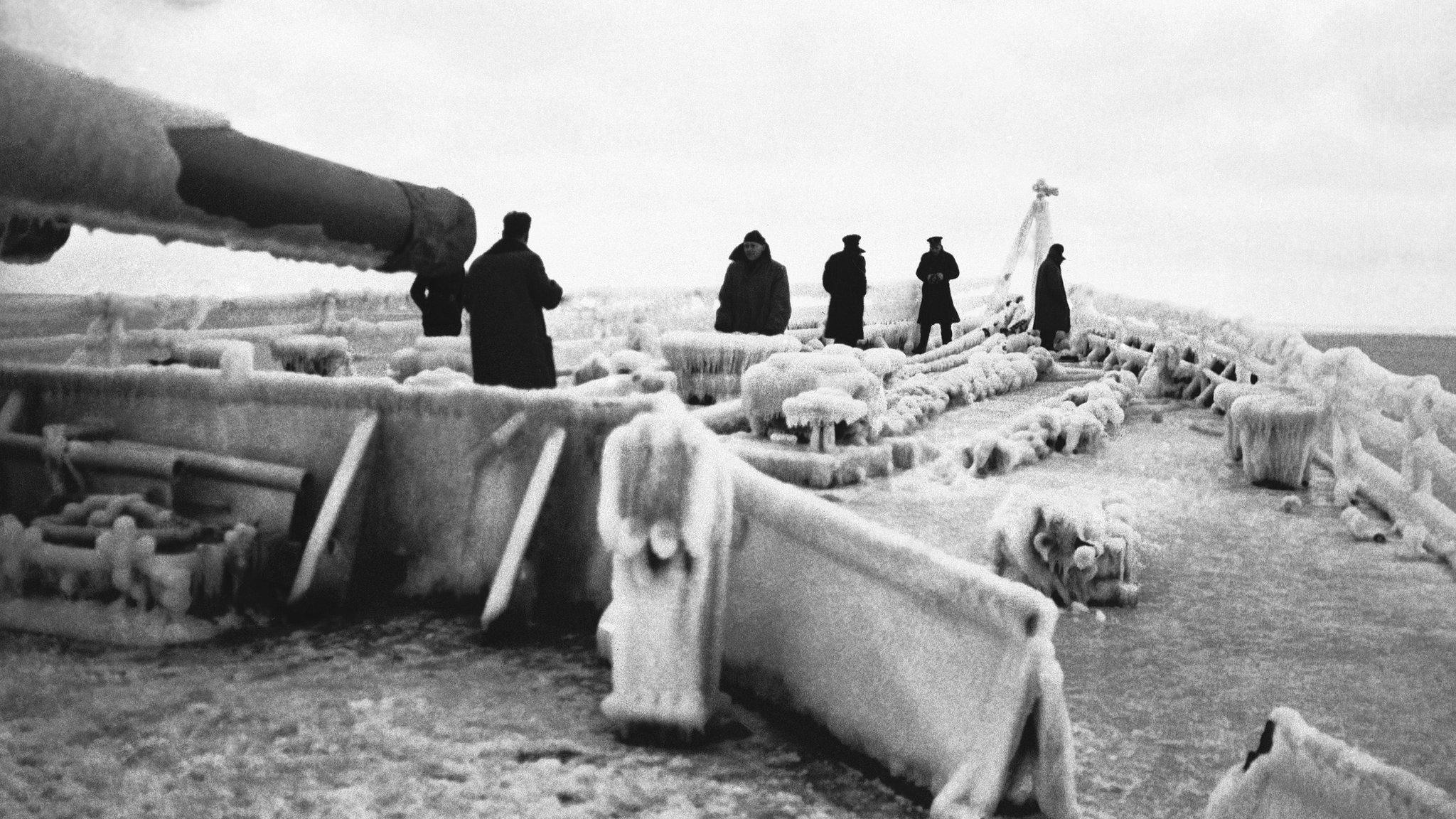 British warship covered in ice during an Arctic Convoy